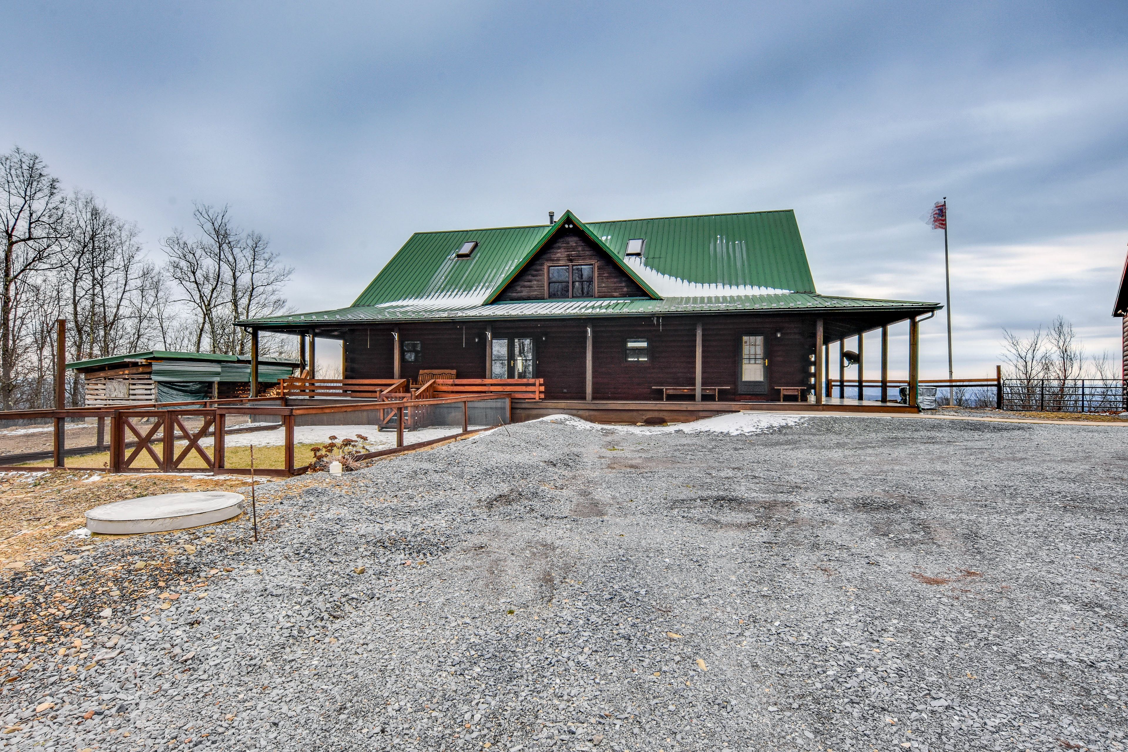 Cabin Exterior | Wraparound Deck | Fenced Yard Area