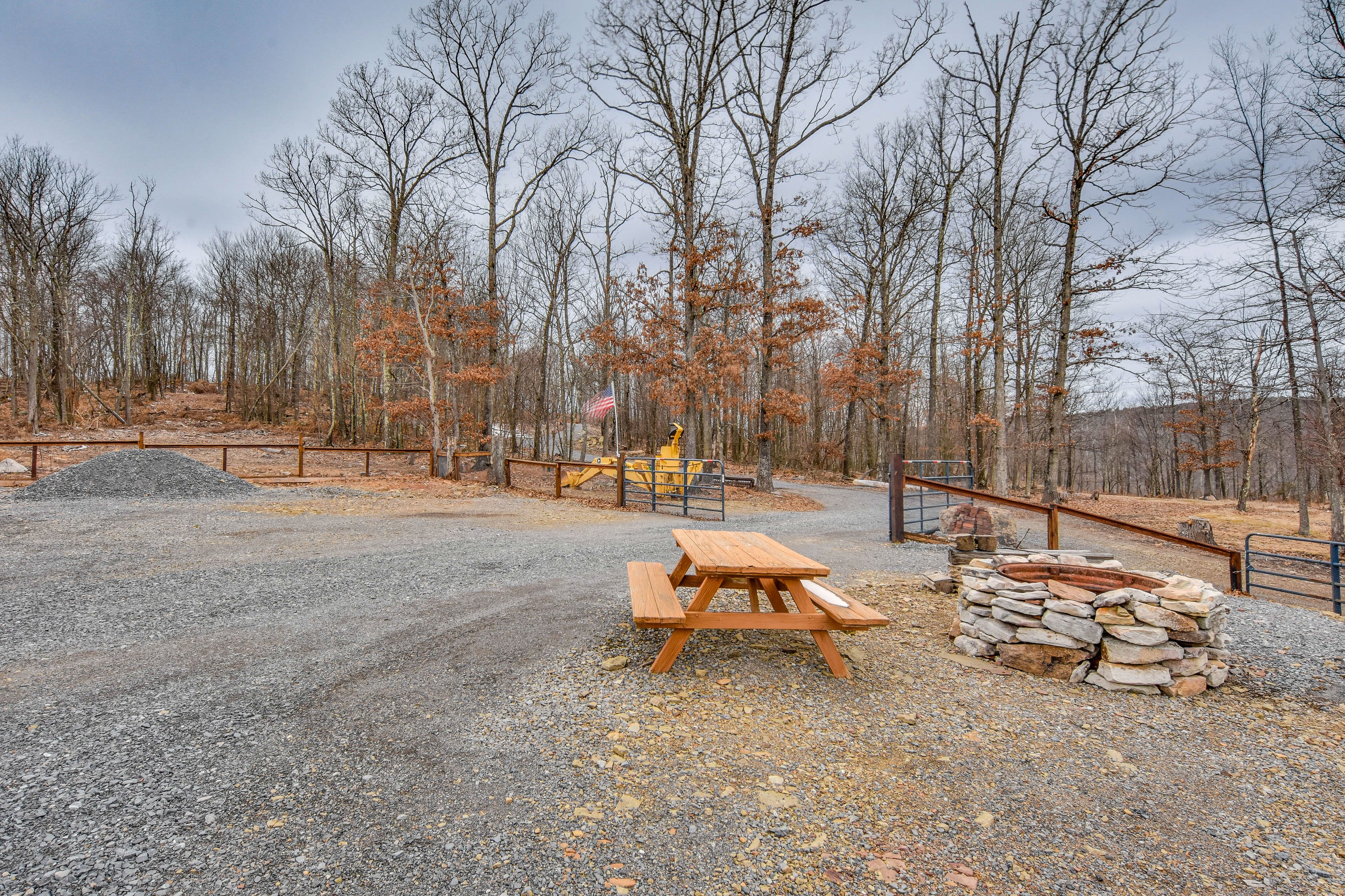 Cabin Exterior | Picnic Table | Wood-Burning Fire Pit