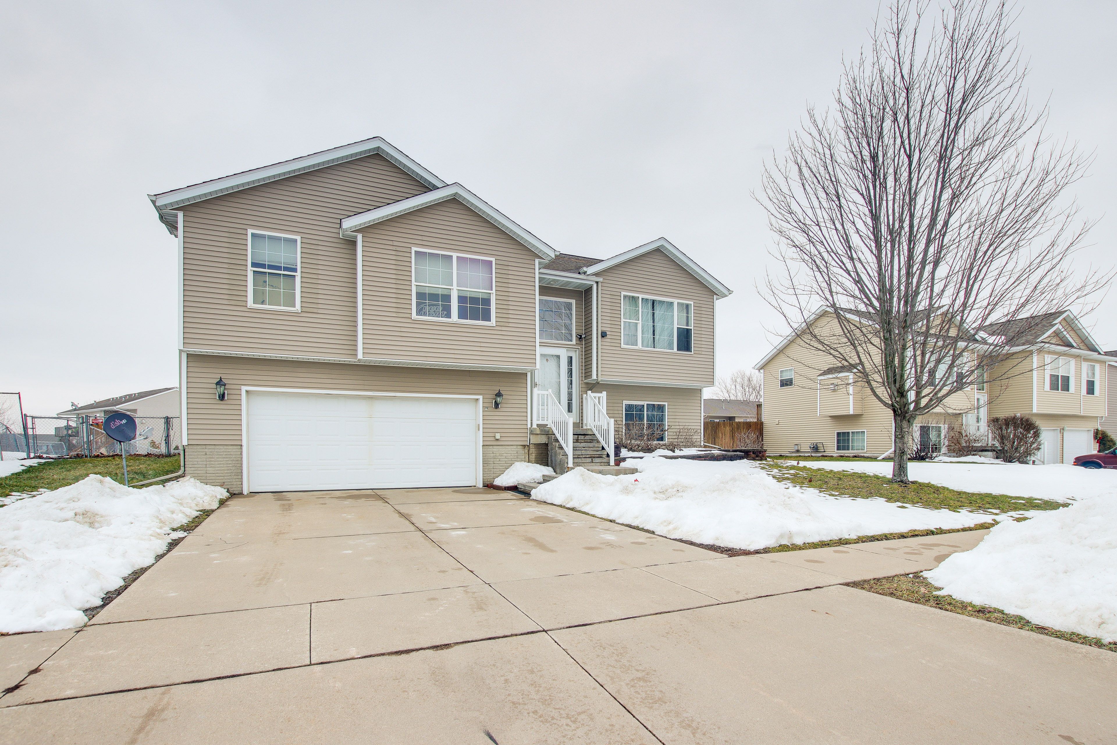 Property Exterior | Garage (2 Vehicles) | Driveway (2 Vehicles)