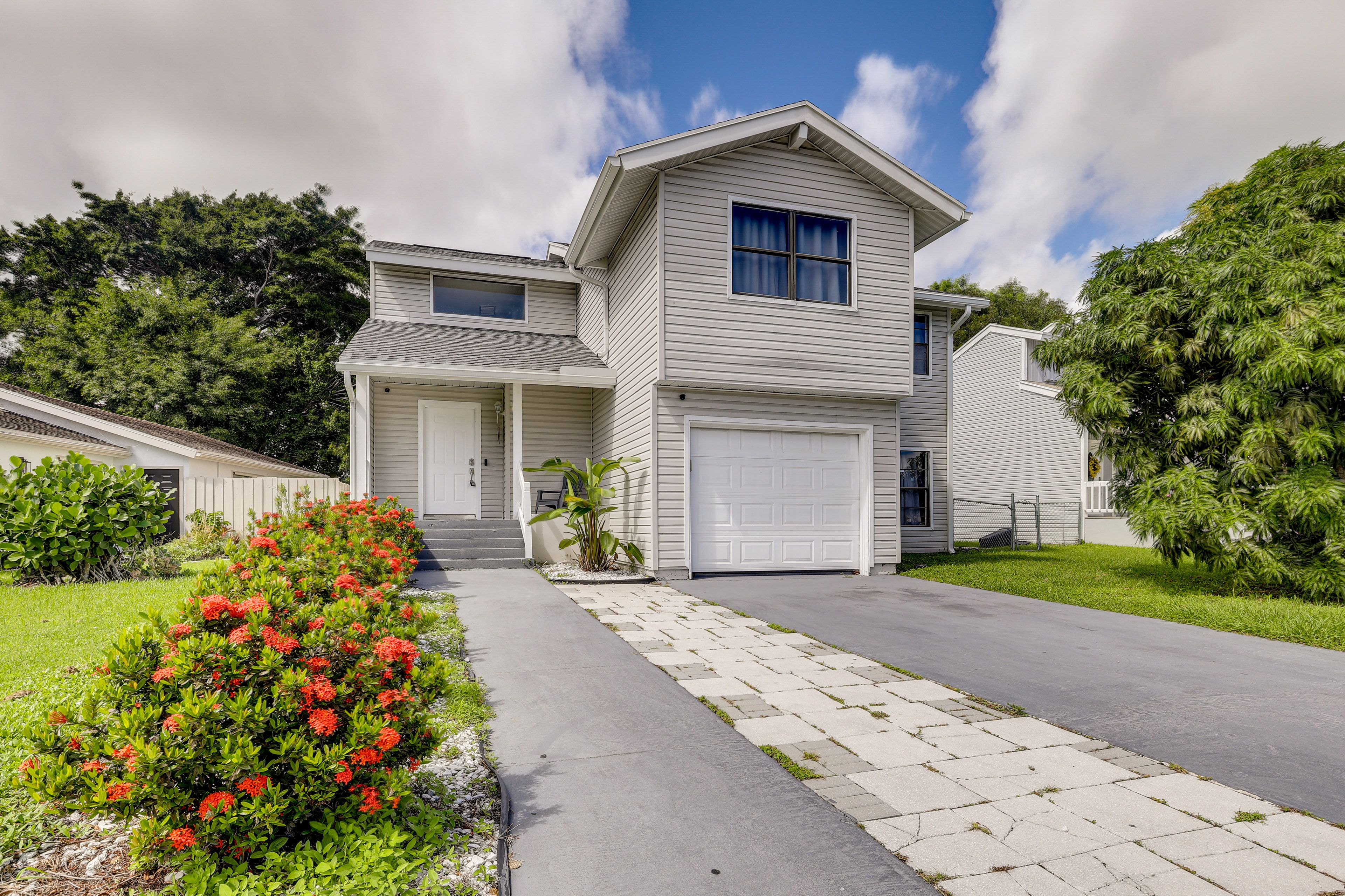 West Palm Beach Vacation Rental | 4BR | 2.5BA | Stairs Required | 2,000 Sq Ft