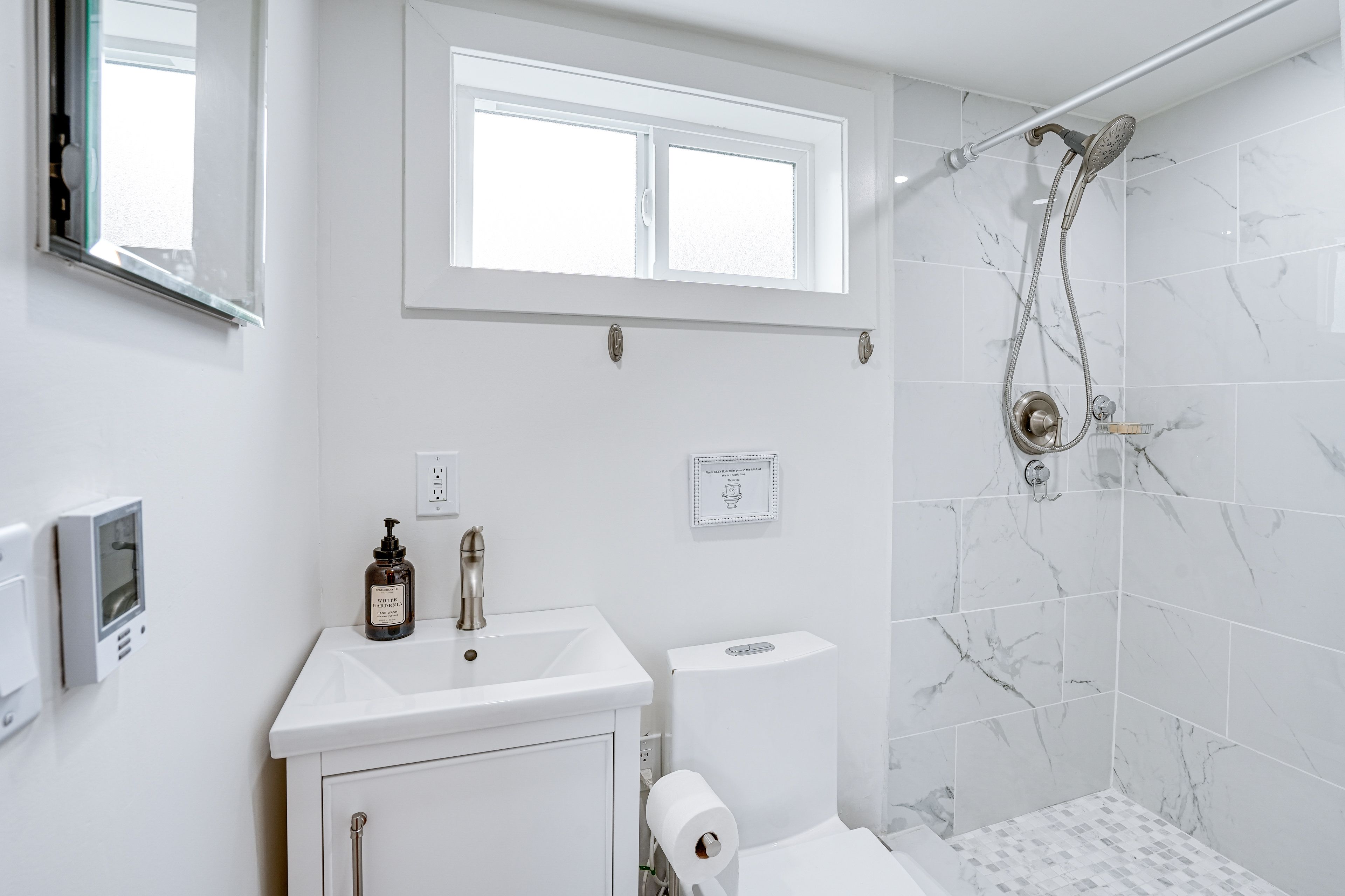 Bathroom | Main Level | Complimentary Toiletries | Walk-In Shower