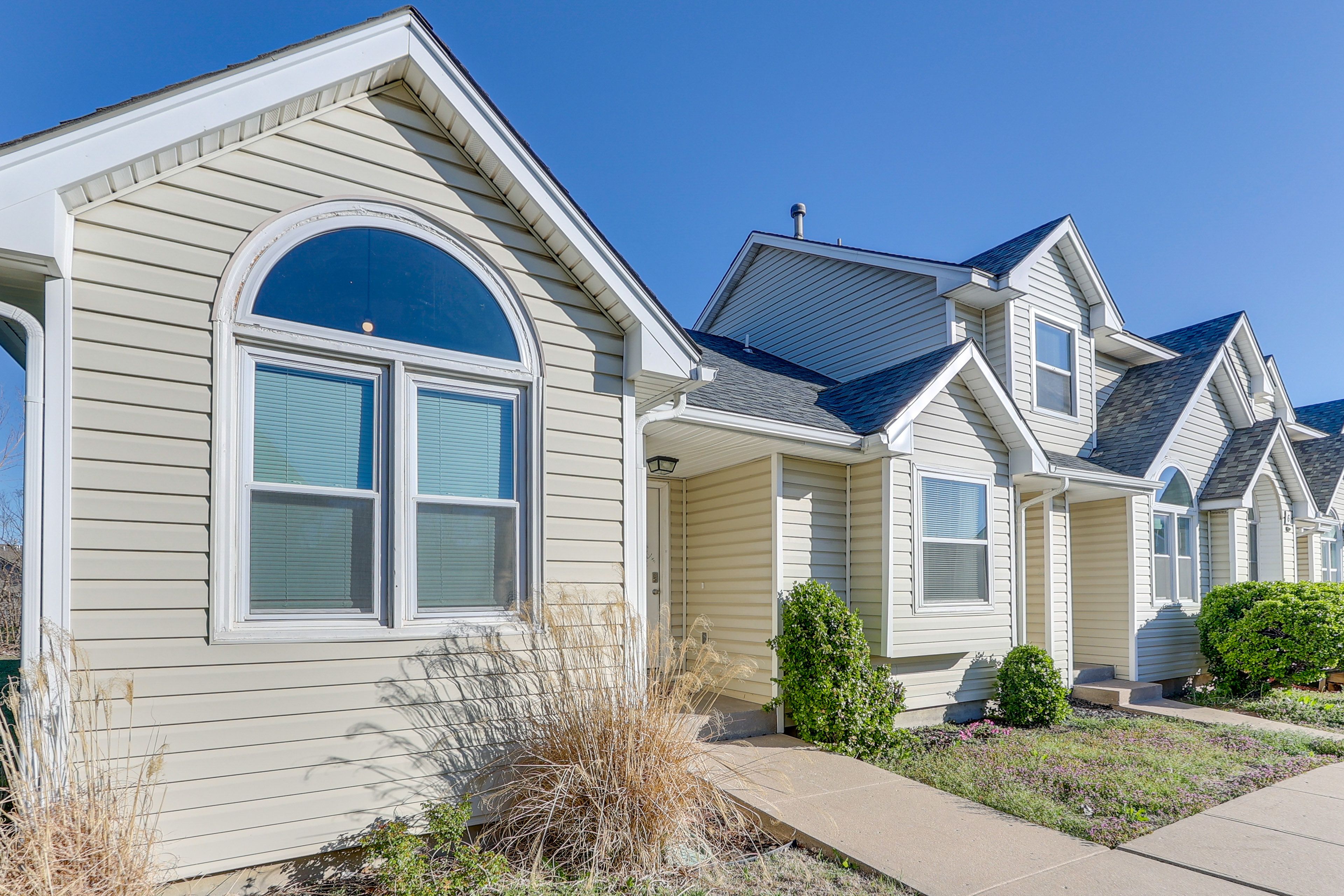 Property Exterior | Community Parking Lot (2 Reserved Spots)