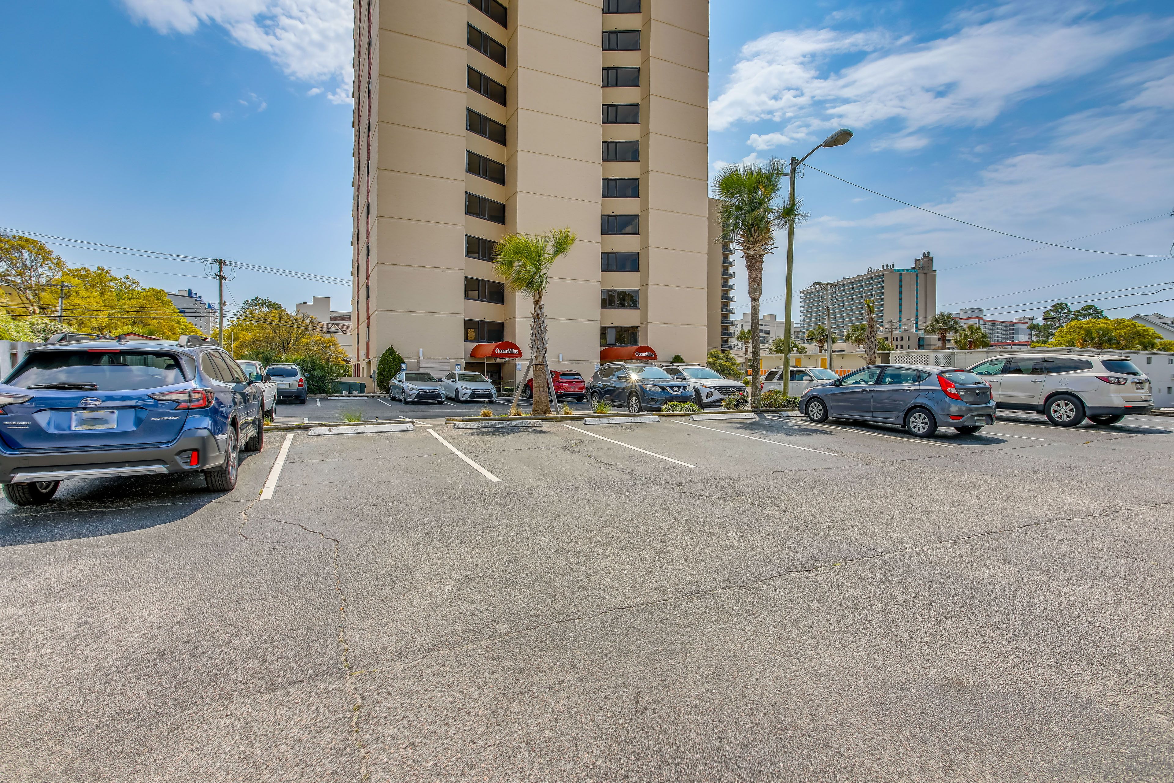 Property Exterior | Open Community Lot (2 Vehicles, Passed Provided)