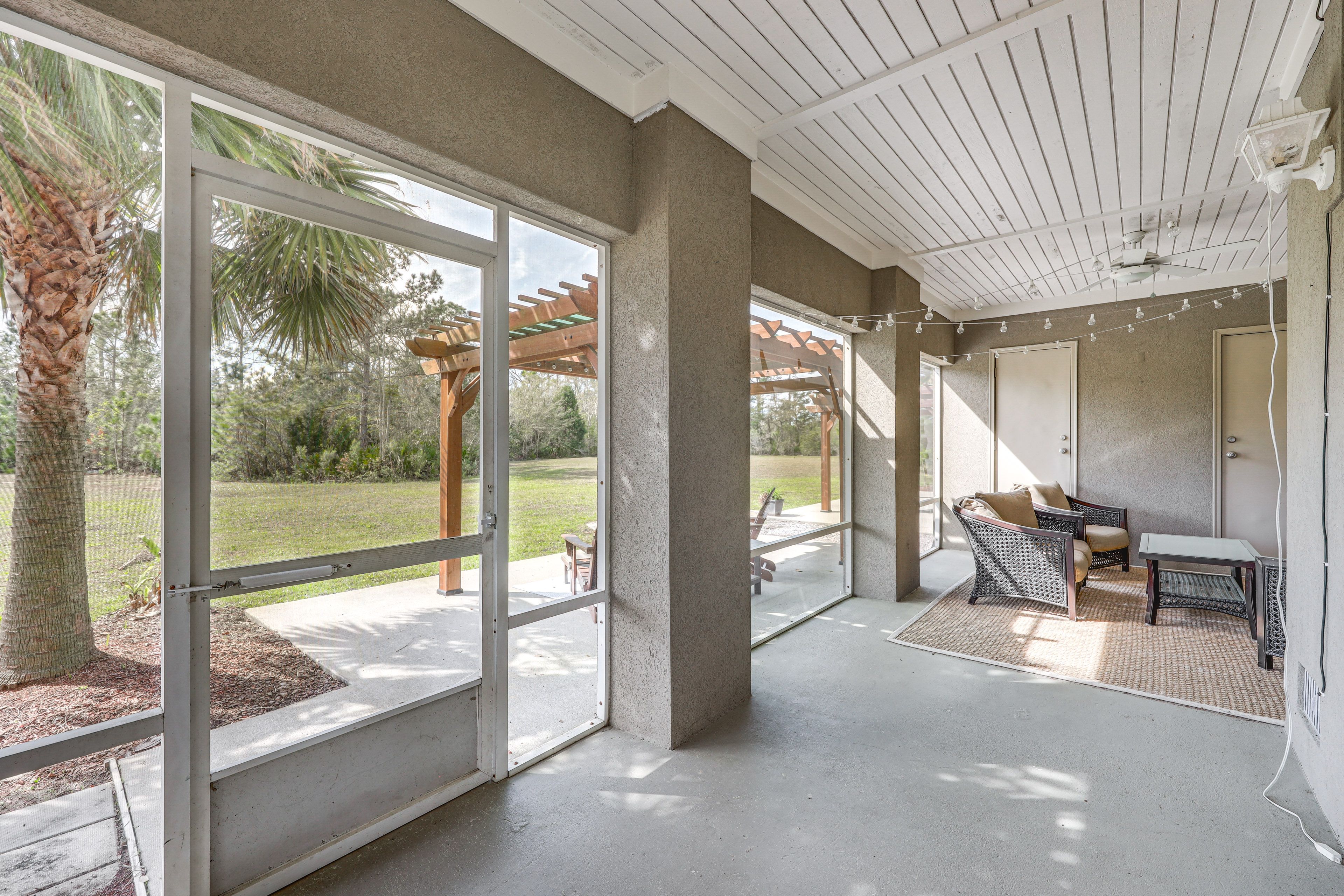 Screened-In Patio | Lounge Area | Gas Grill