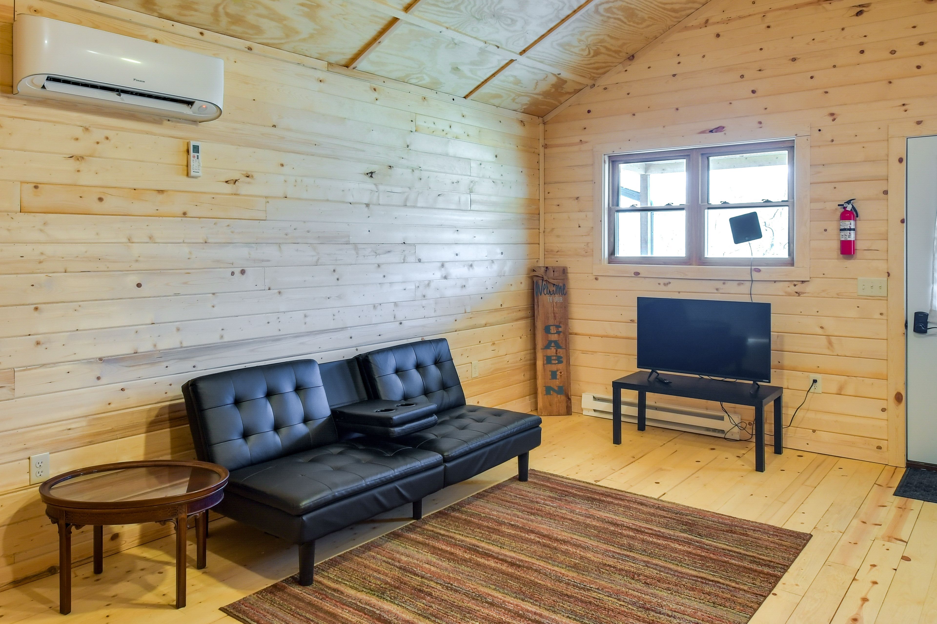 Living Room | Smart TV | Mini-Split A/C & Heat | Baseboard Heat