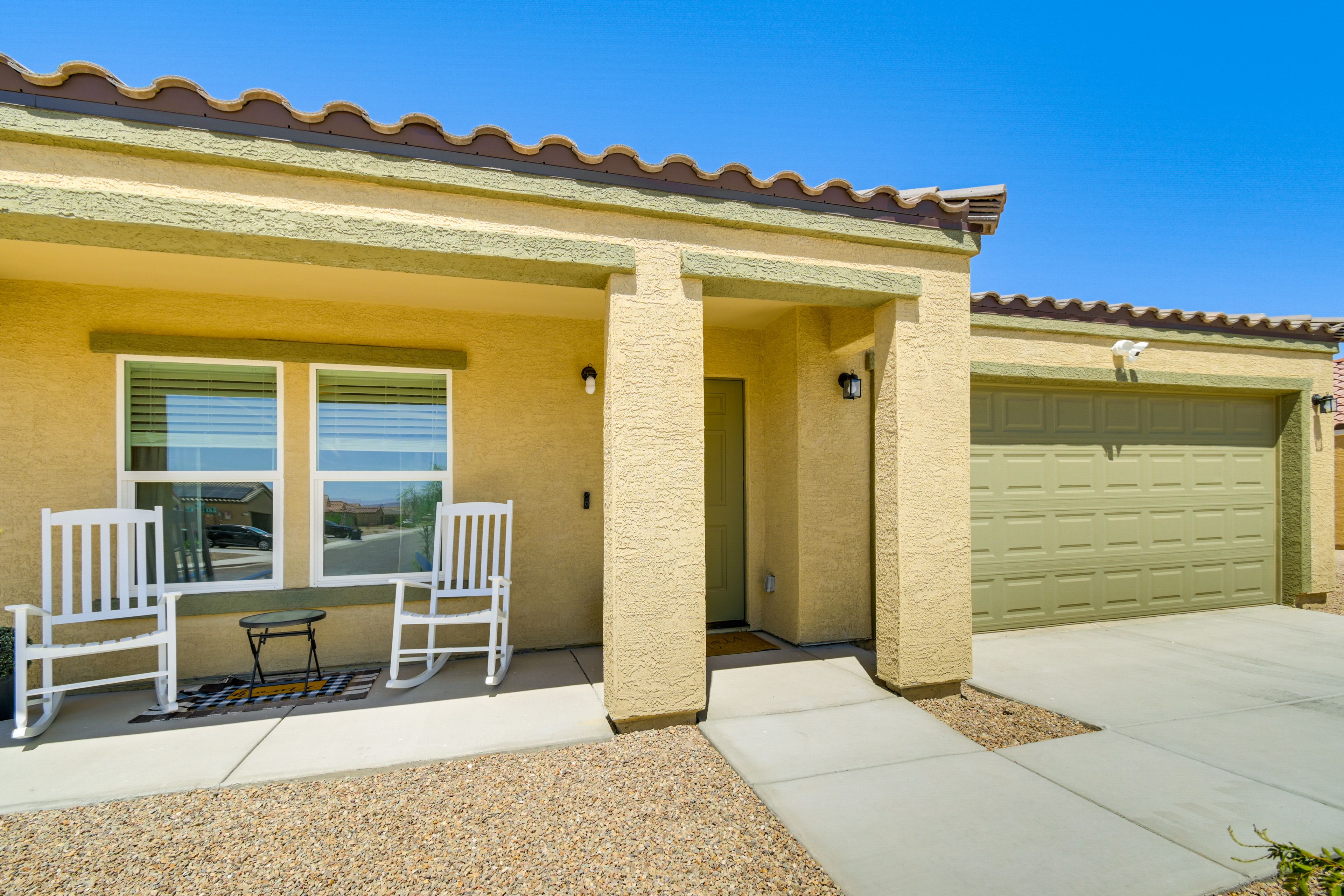 House Exterior | Back Patio | Fenced Backyard | Rocking Chairs Not Available