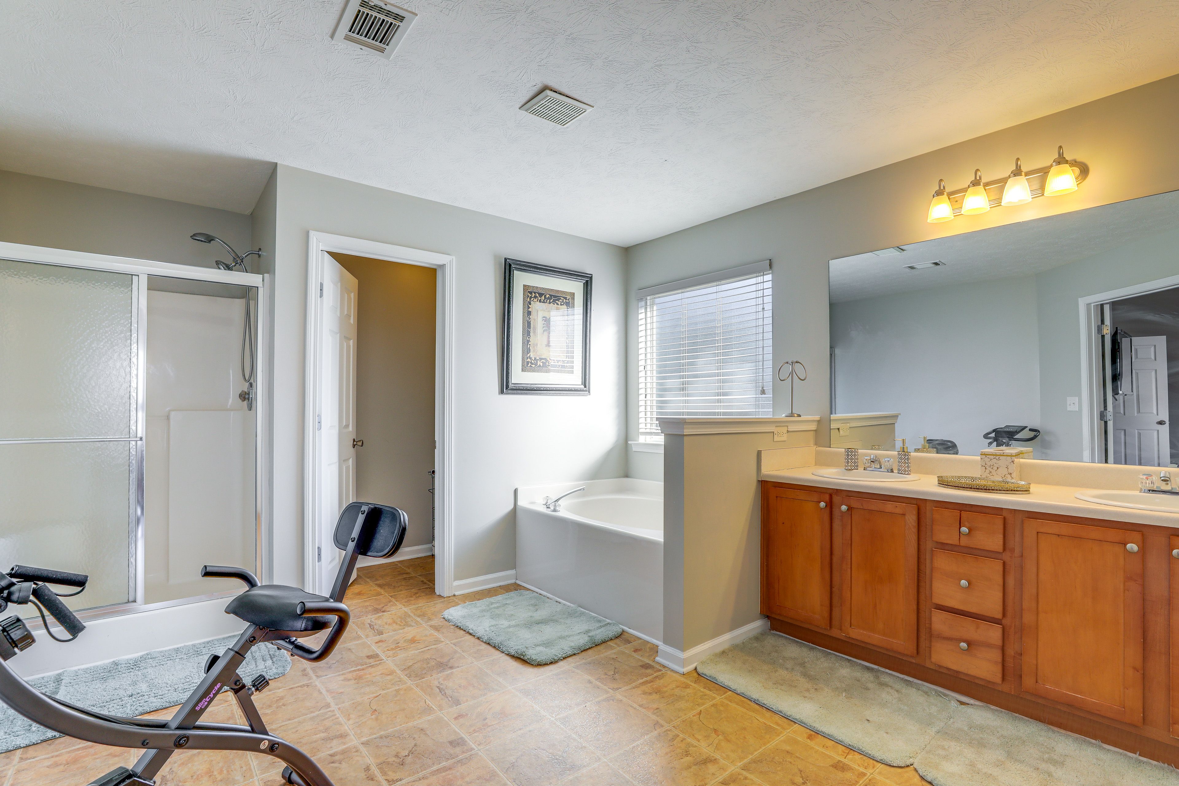 En-Suite Bathroom | 2nd Floor | Towels Provided | Exercise Bike