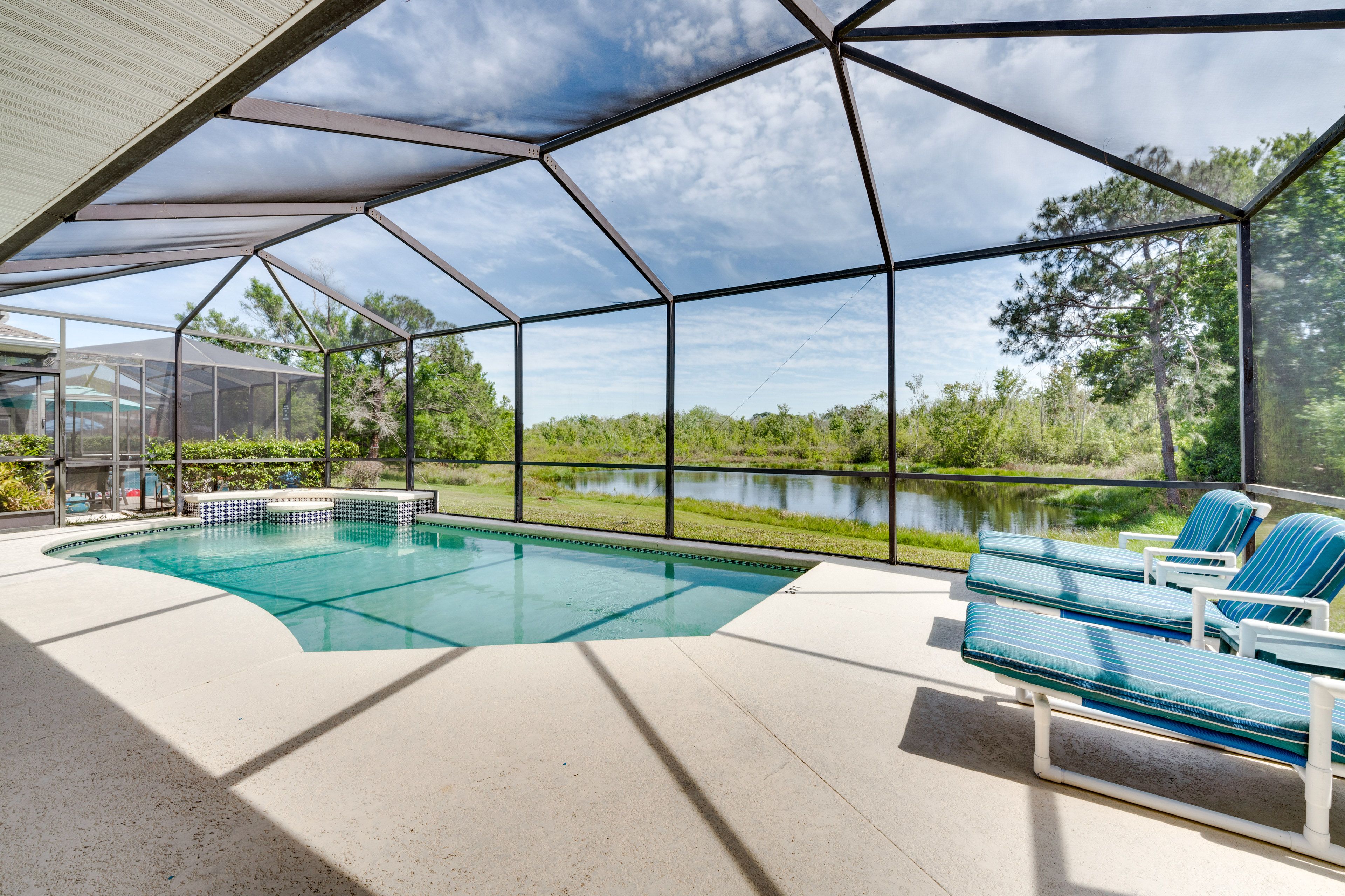 Private Lanai | Pool | Lounge Chairs | Pond View