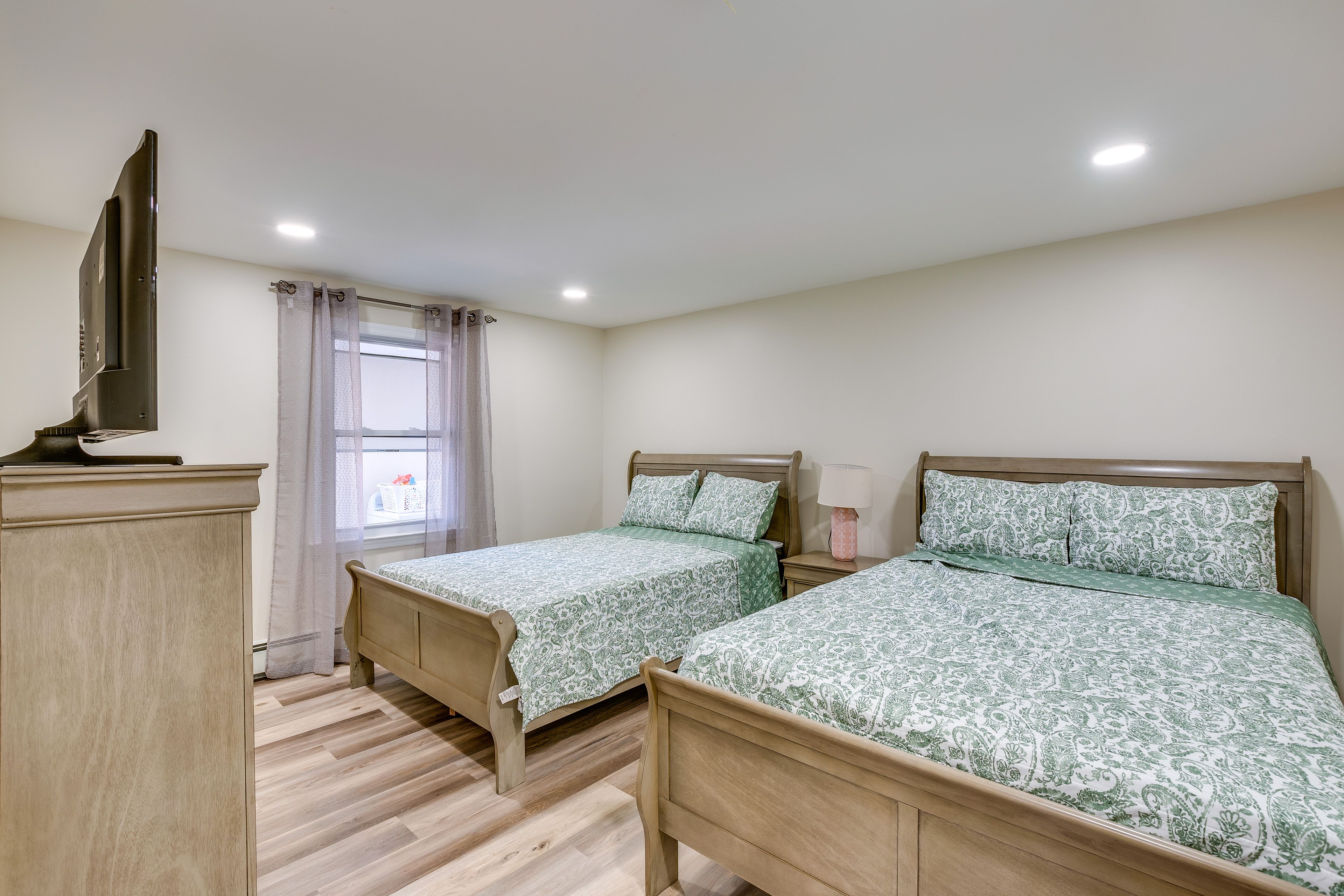 Bedroom 1 | 2 Full Beds | Linens Provided