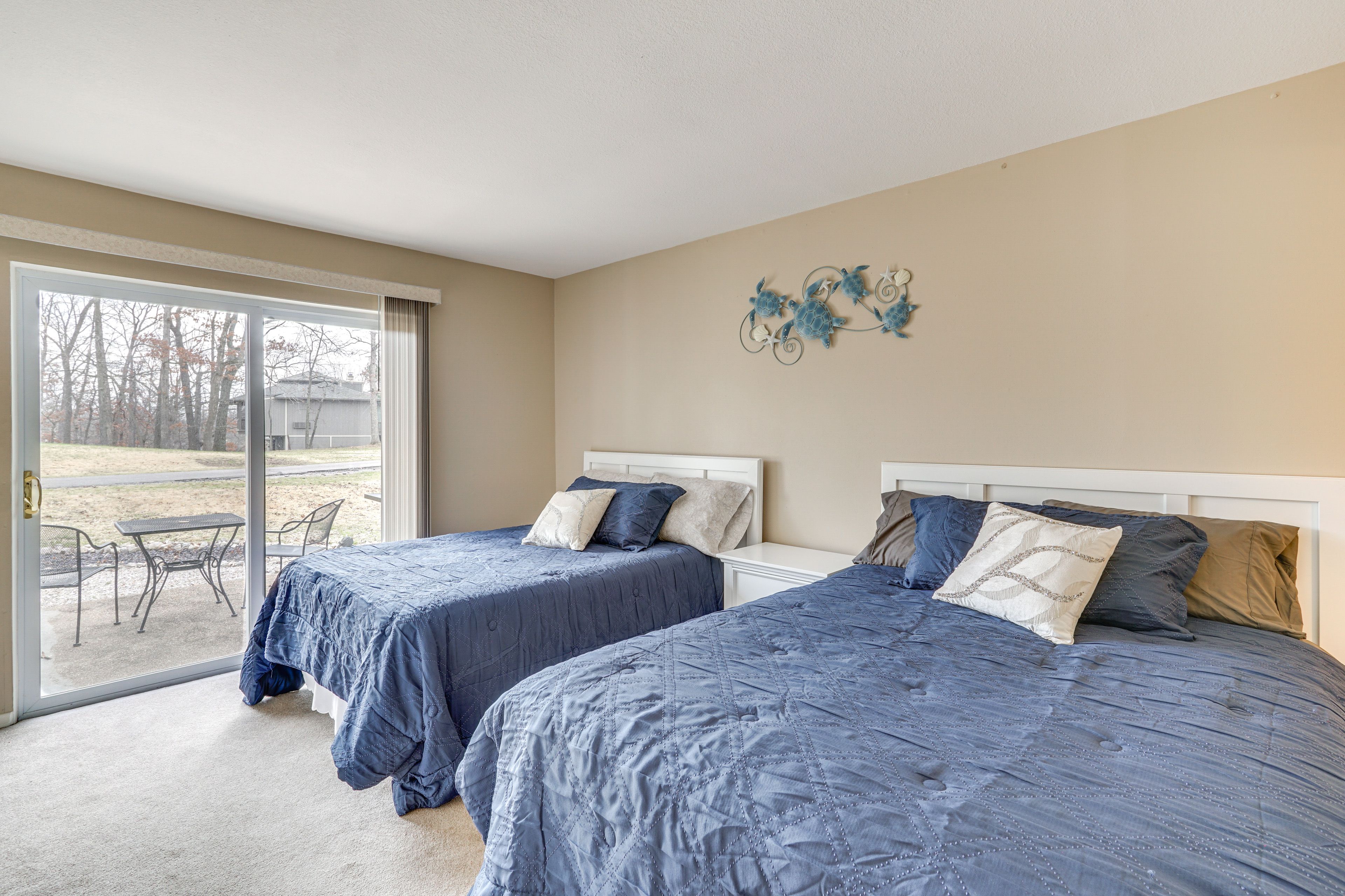 Bedroom 1 | Queen Bed | Full Bed | Patio Access