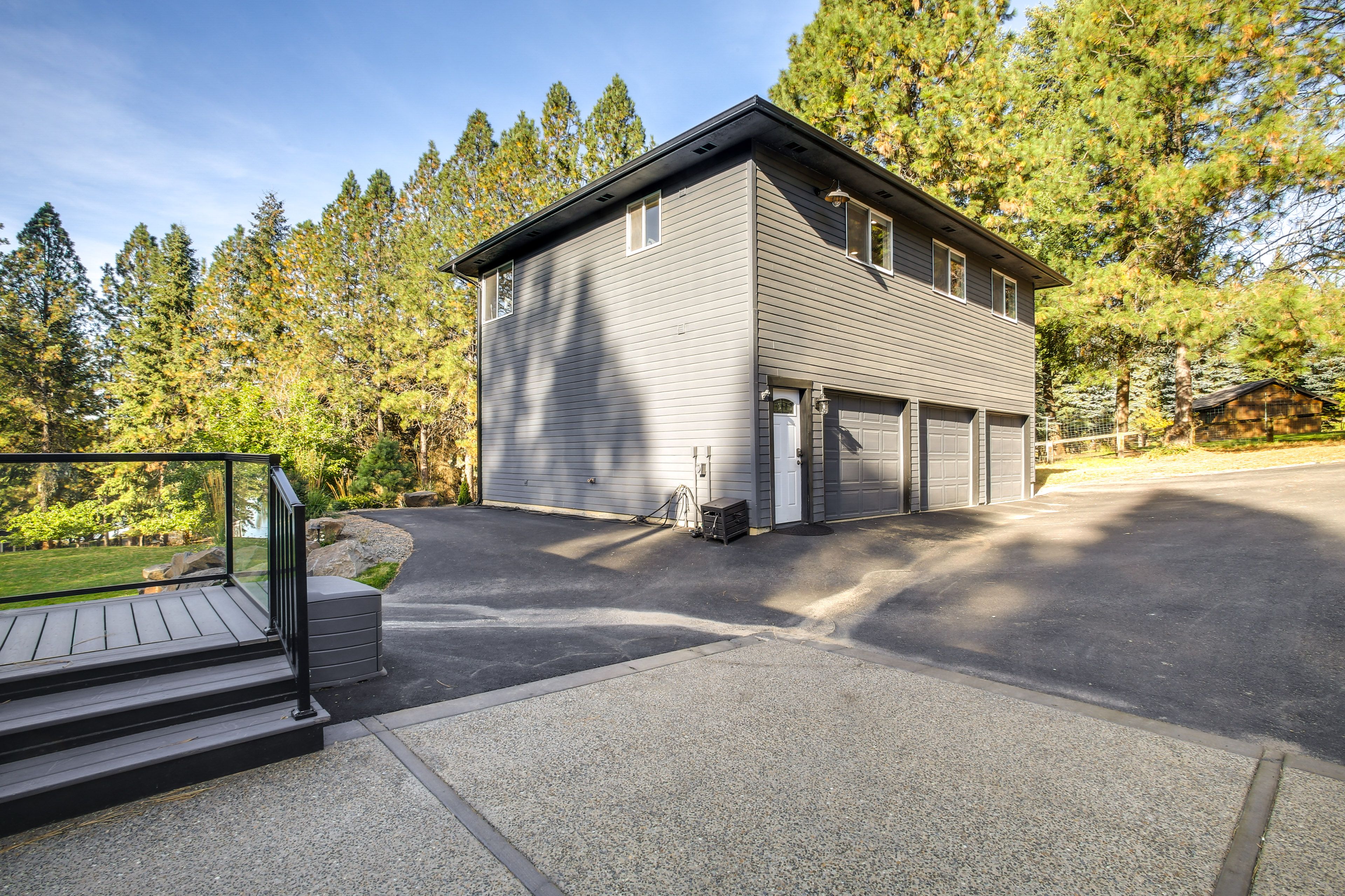 Parking | Space Next to Garage (1 Vehicle) | Adjacent Gravel Lot (1 Vehicle)