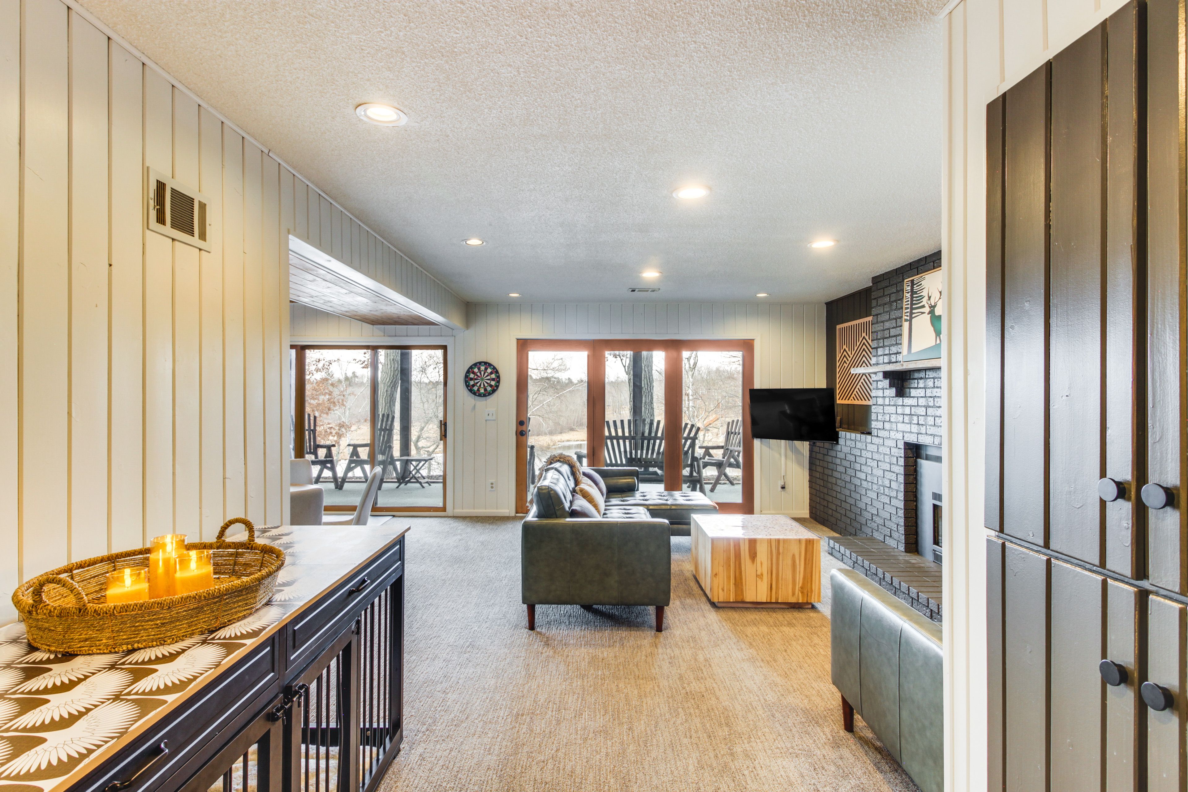 Living Room | Lower Level | Flat-Screen TV | Fireplace | Double Dog Crate