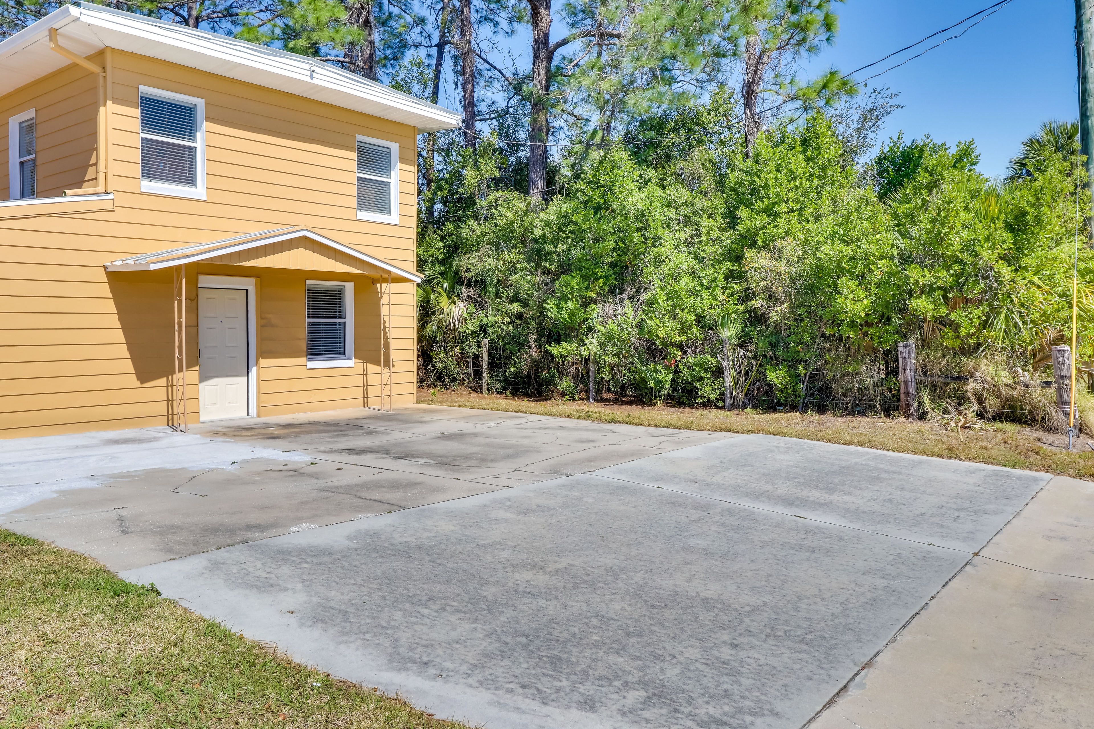 Parking (Shared) | Driveway (2 Vehicles) | Dirt Path (Additional Vehicles)