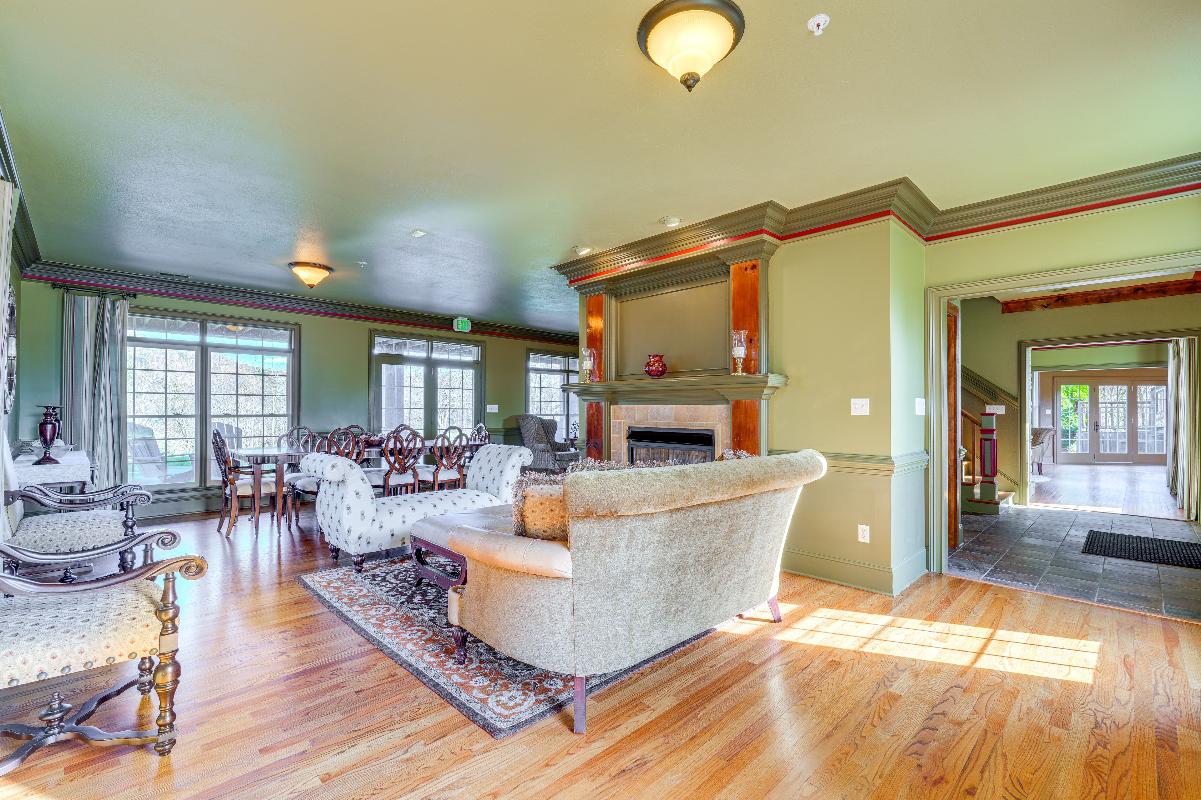 Living Room | 1st Floor | Decorative Fireplace | Dining Table | Mountain Views