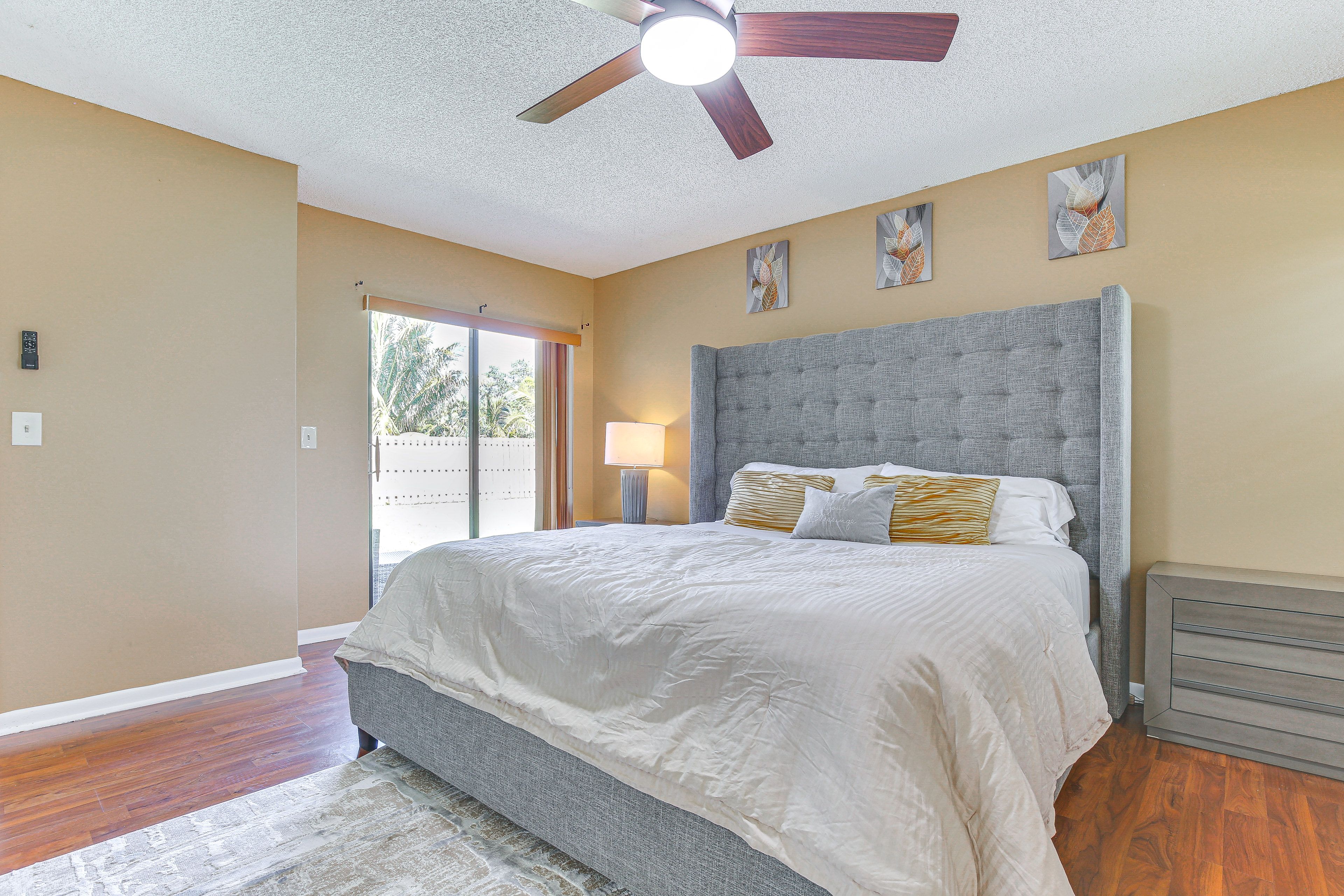 Bedroom 1 | King Bed | Smart TV | Desk | En-Suite Bathroom | Patio Access