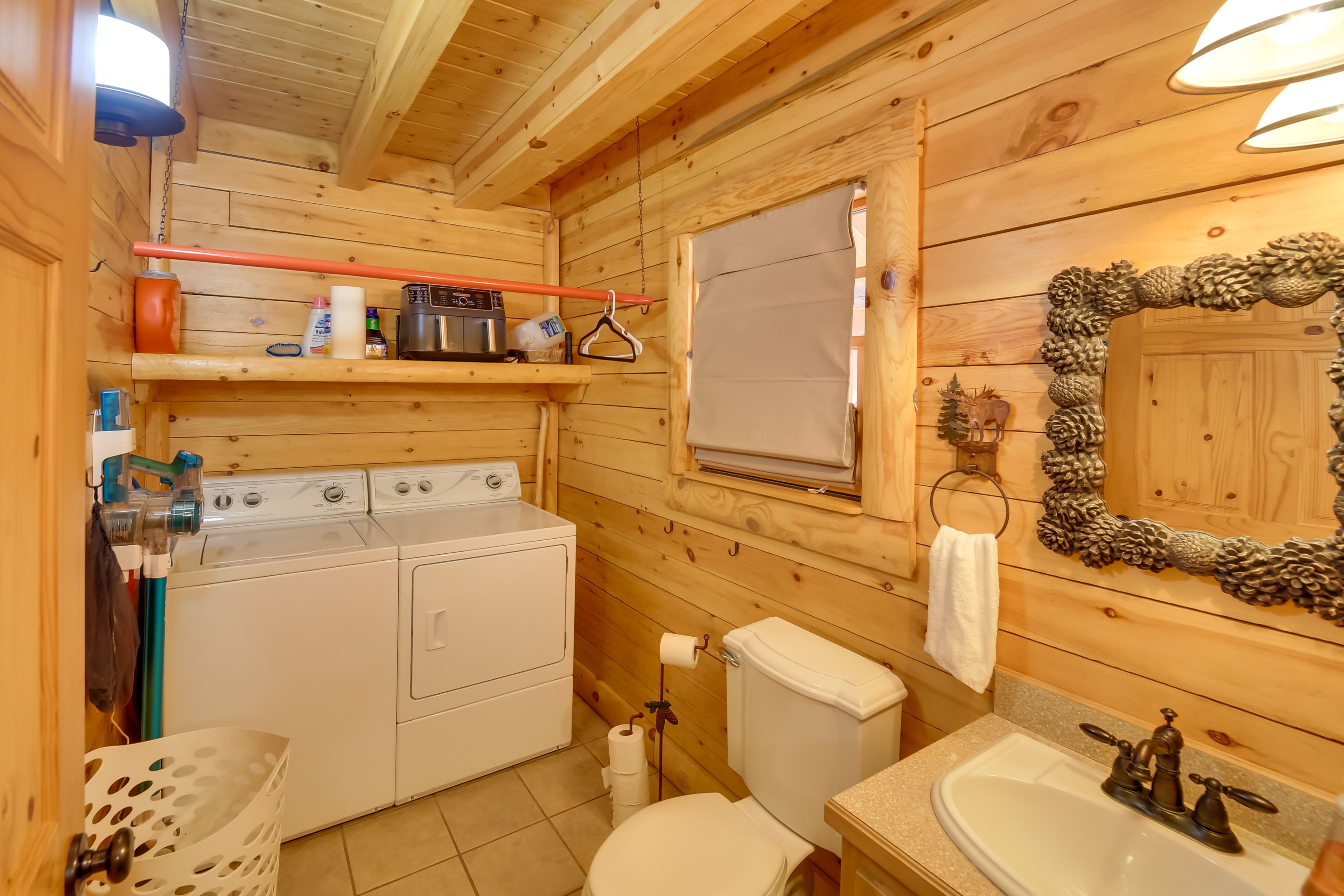 Half Bathroom | Washer & Dryer | Main Level