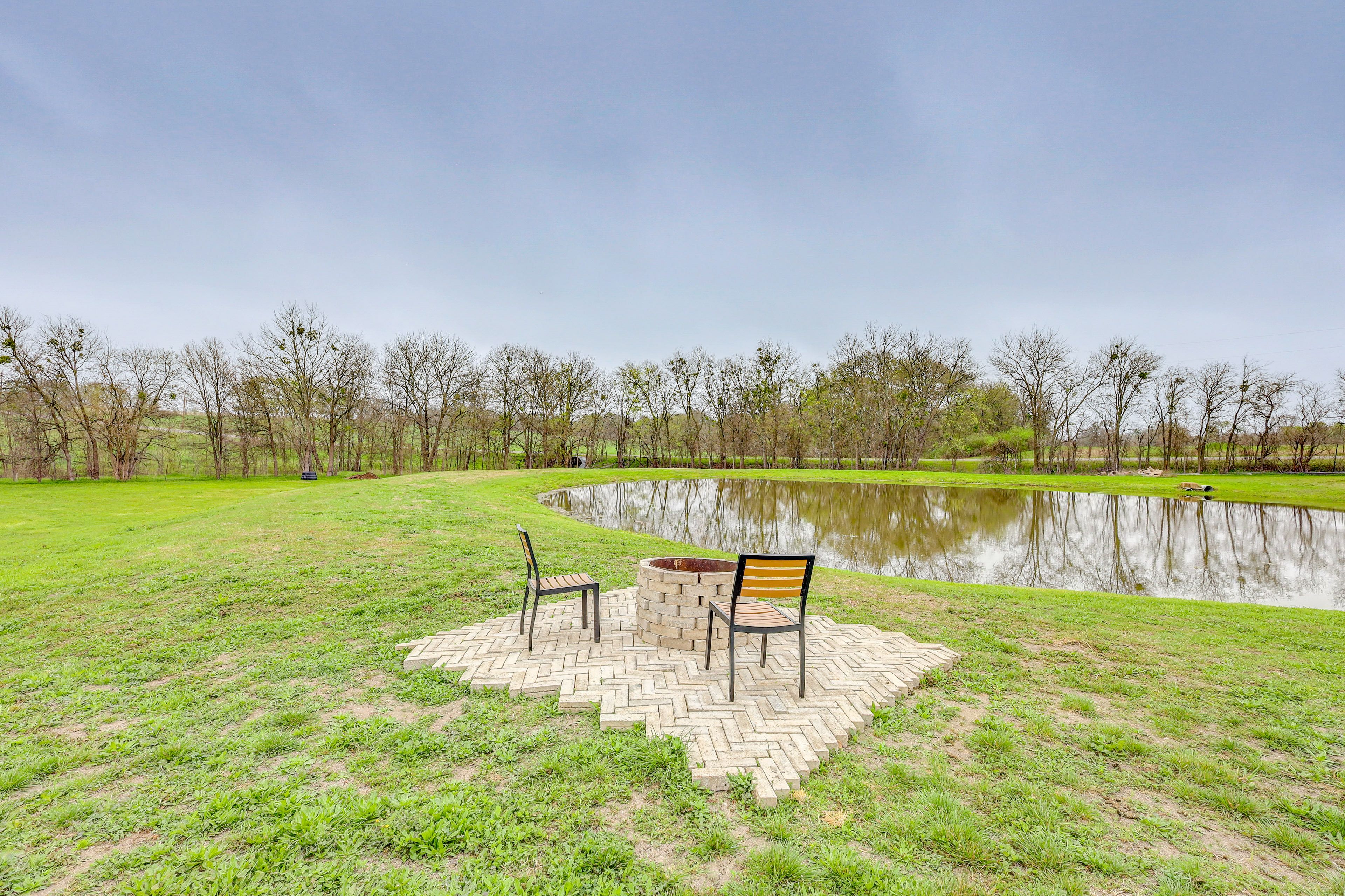 Exterior | Wood-Burning Fire Pit | Fishing Pond Access