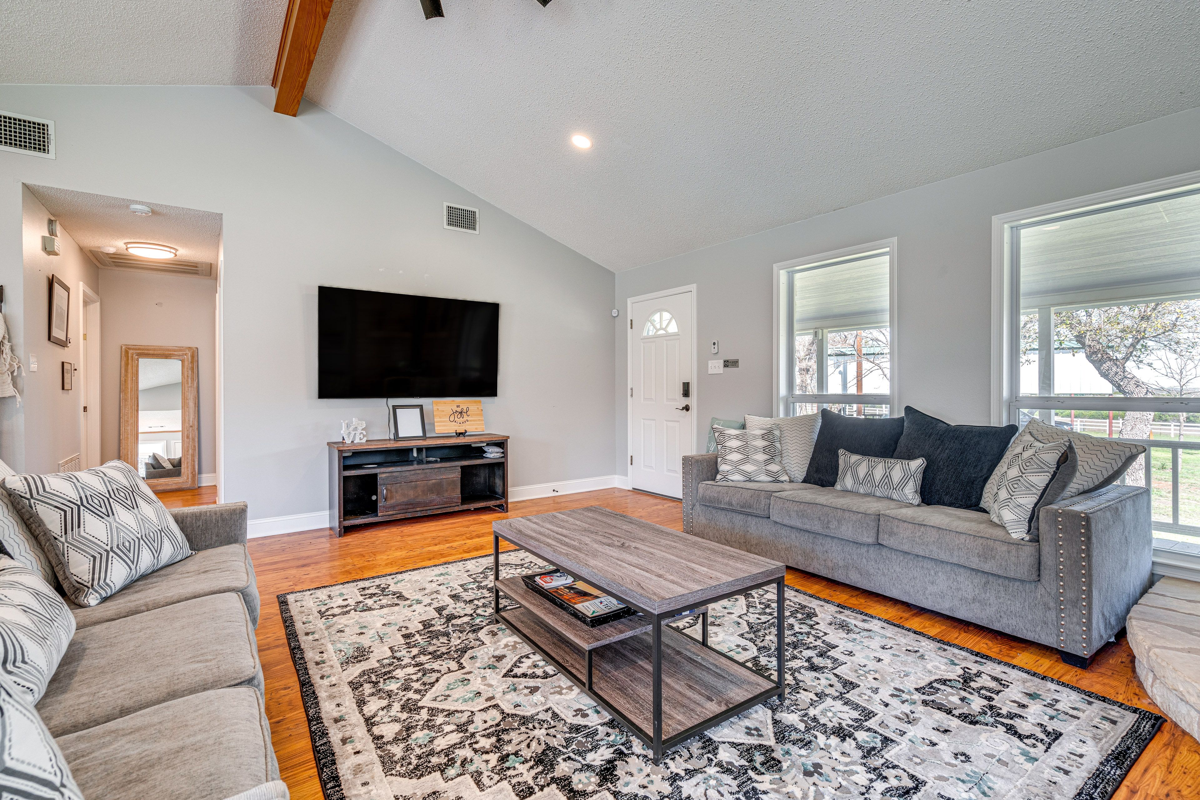 House 1 Living Room | Flat-Screen TV | 2 Queen Sleeper Sofas