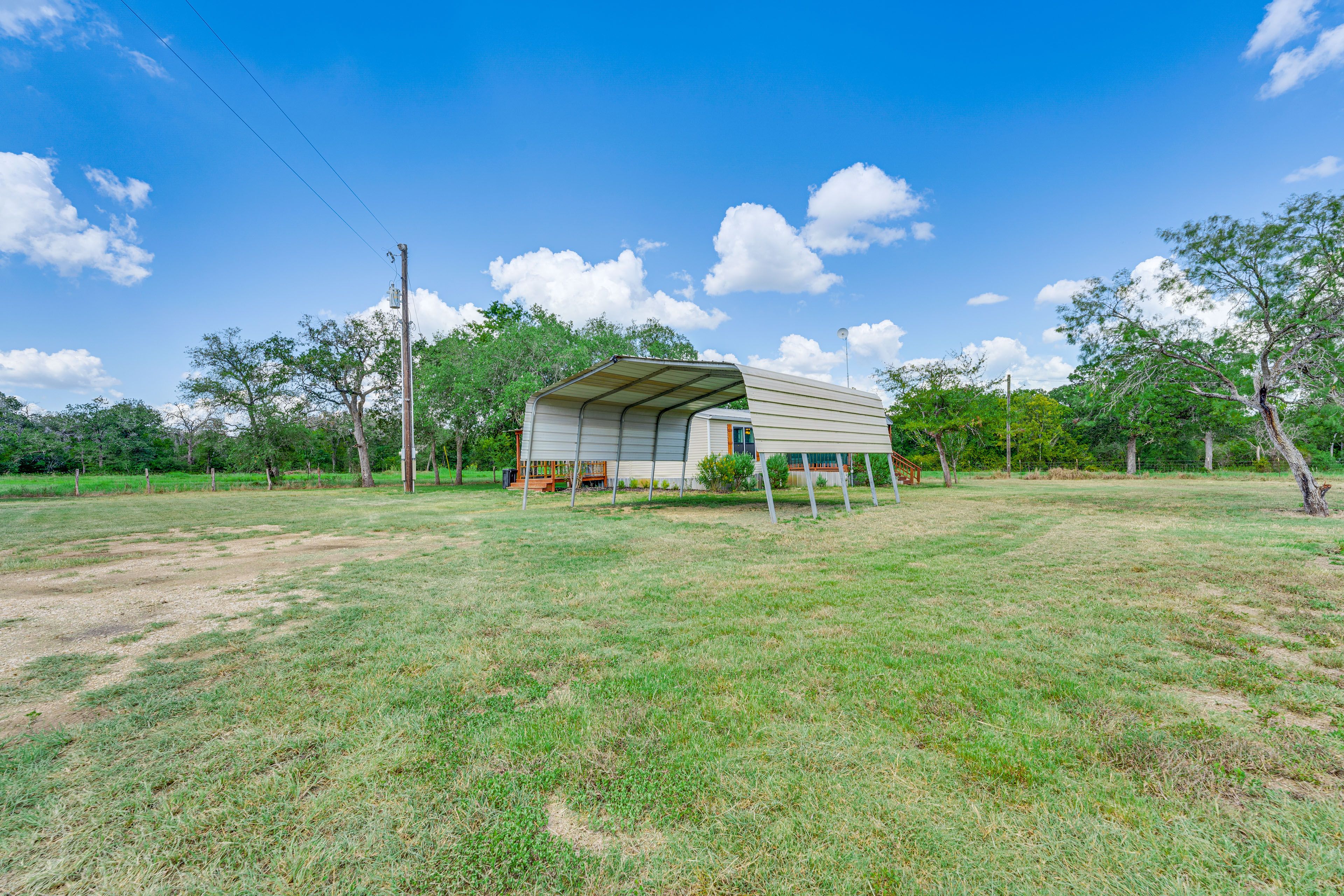 Parking | Gravel Driveway (6 Vehicles) | Carport (2 Vehicles)