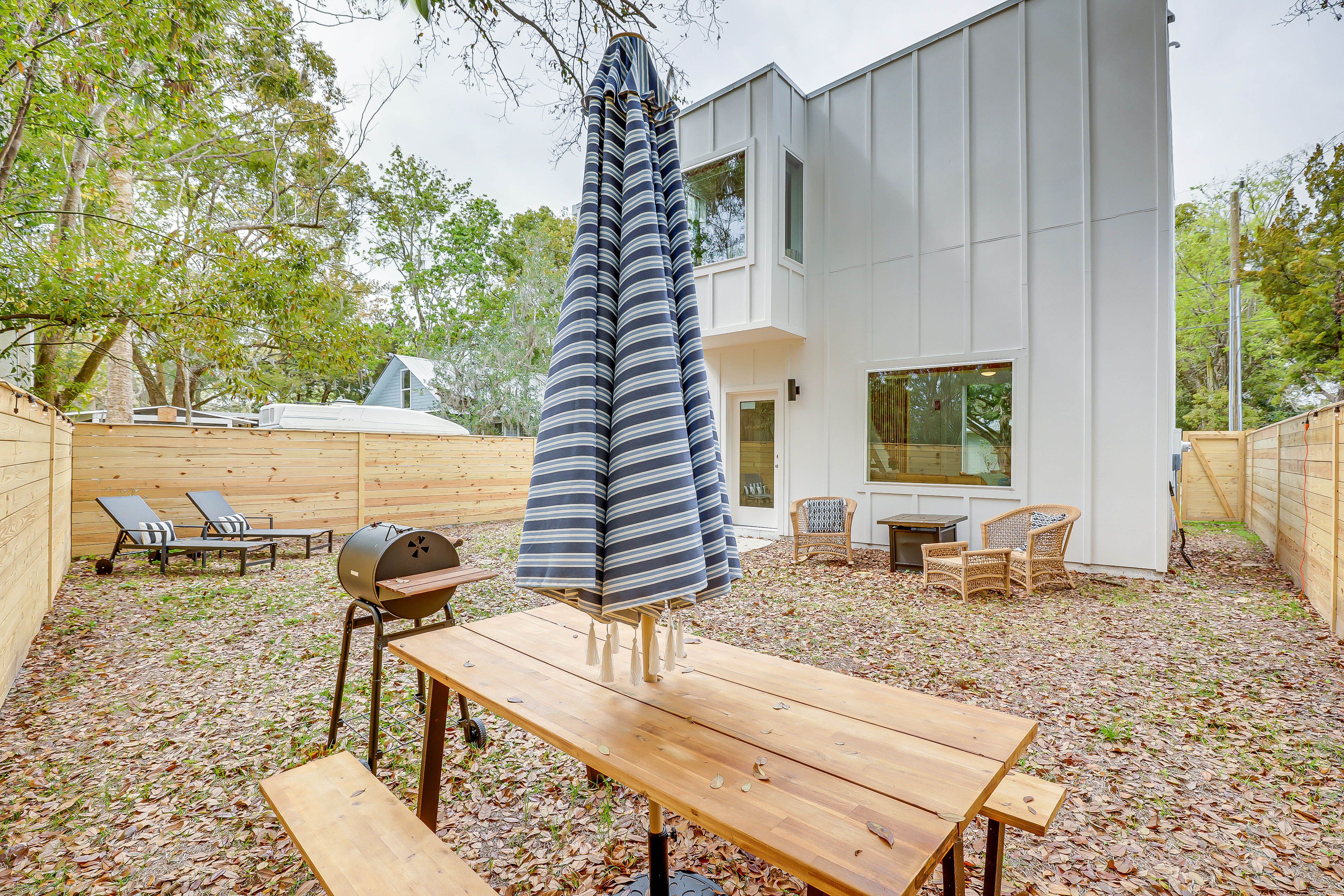 House Exterior | Picnic Table | Charcoal Grill | Fire Pit | Fenced Backyard
