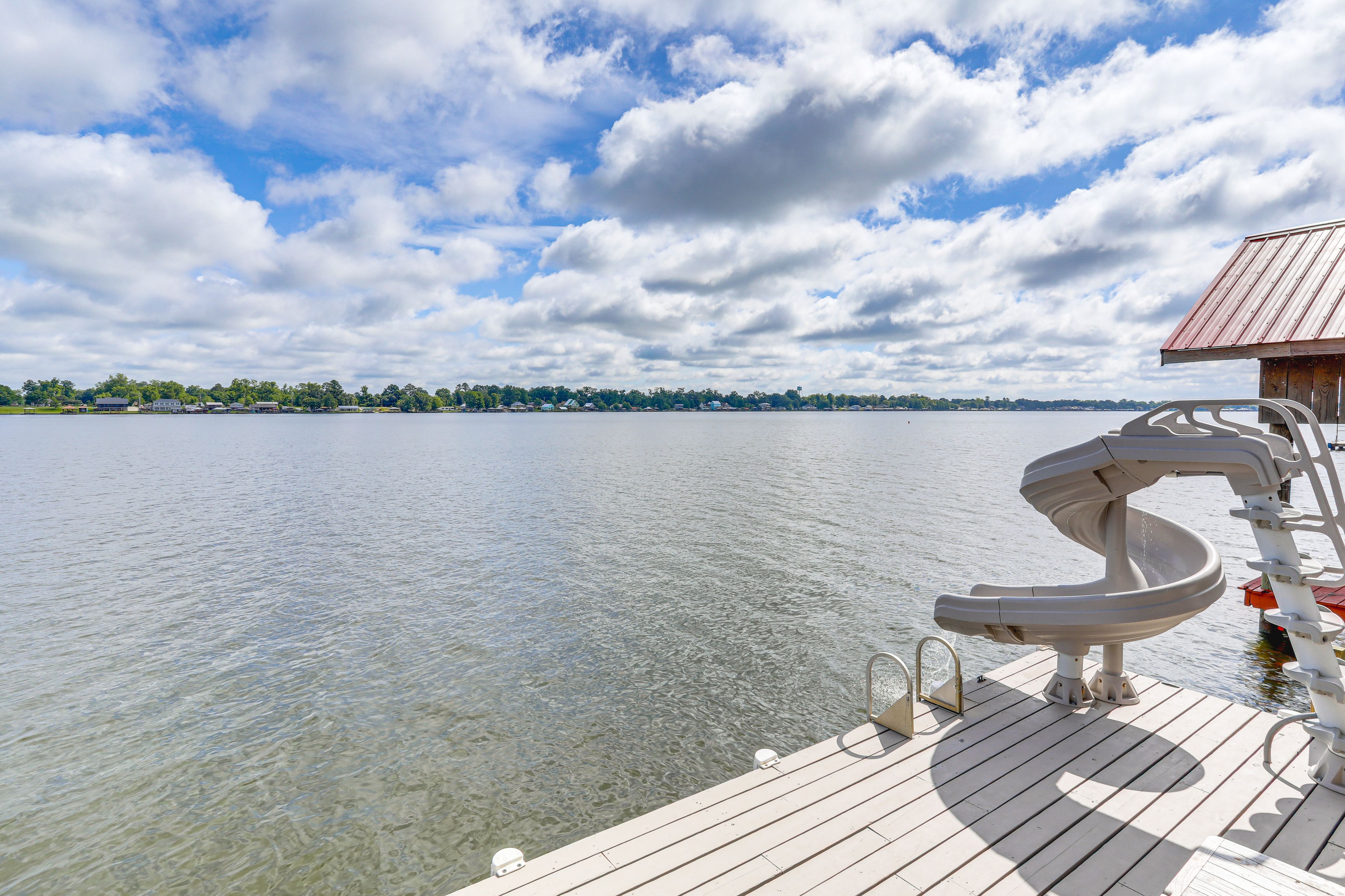 Boat Dock | Water Slide | Gas Grill | Outdoor Dining Area | River Access