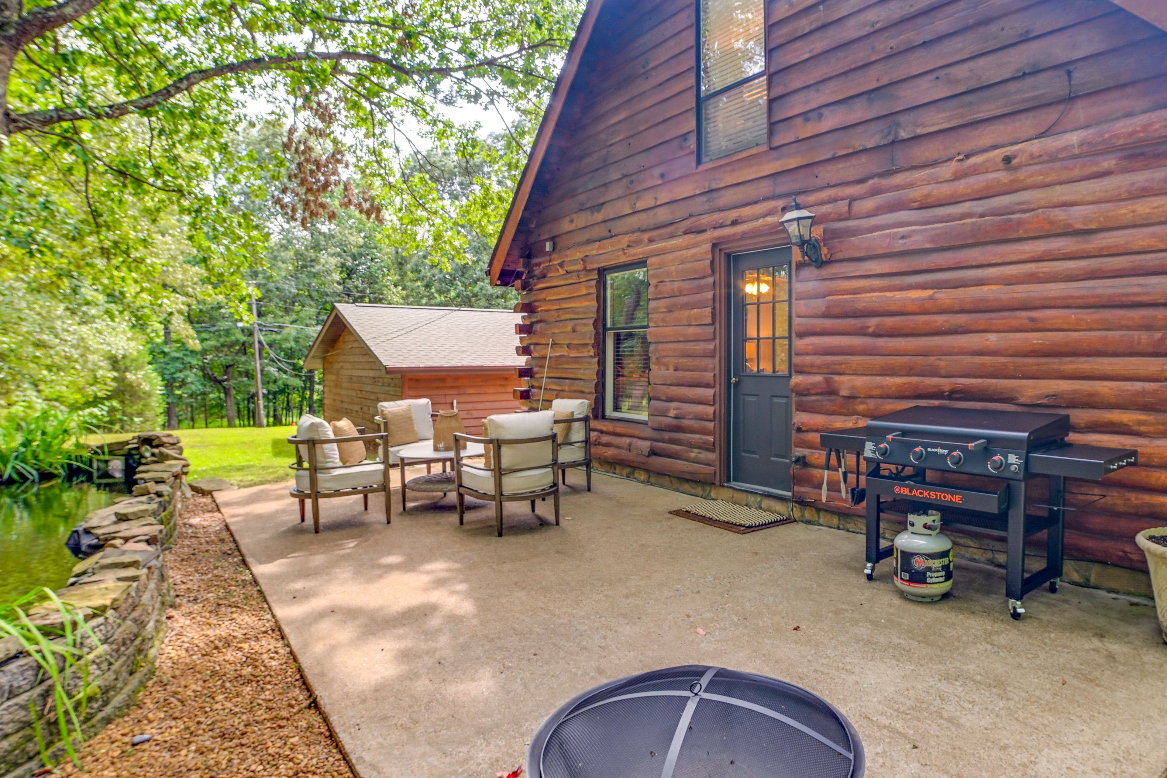 Cabin Exterior | Furnished Patio | Blackstone Griddle | Fire Pit
