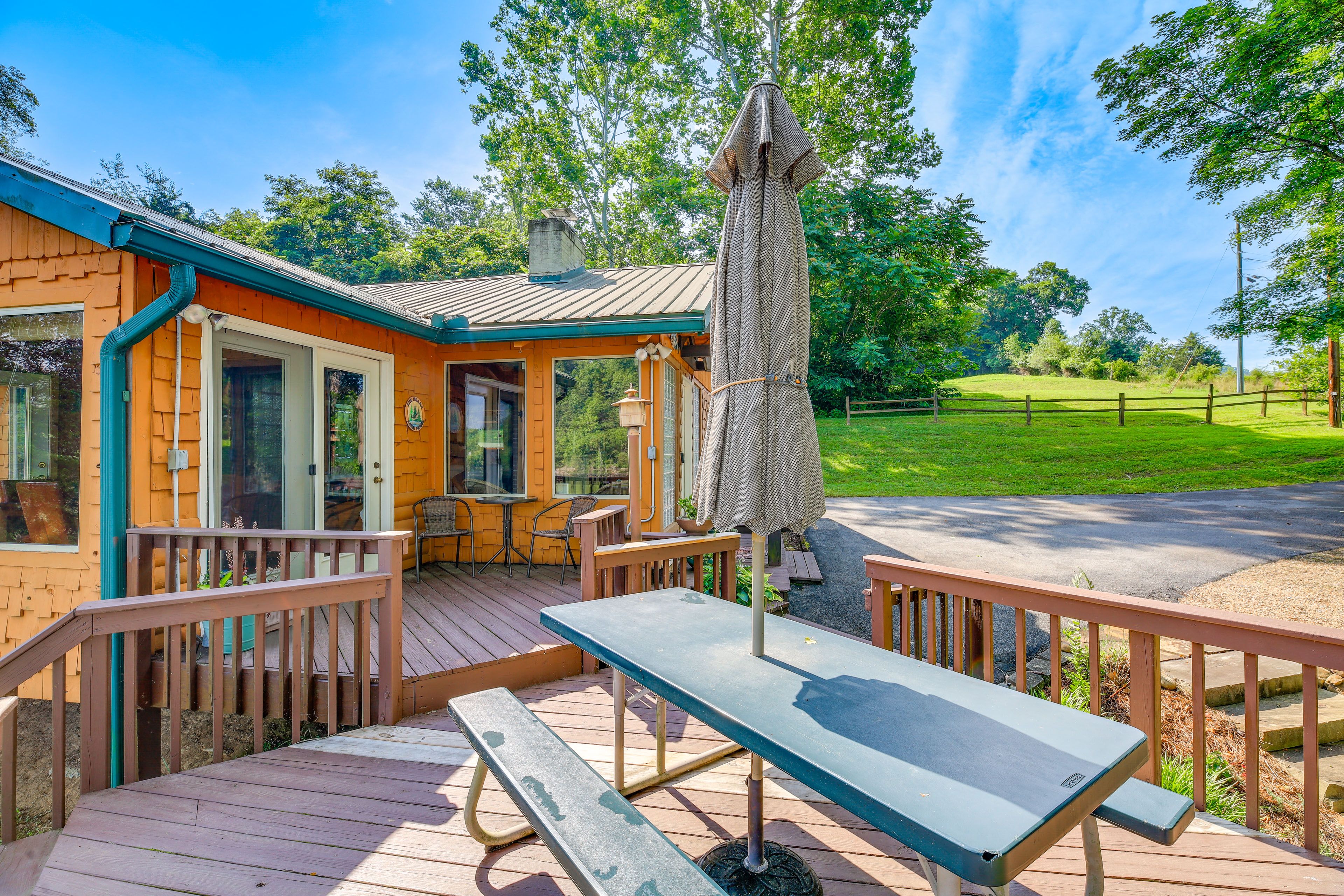Deck | Gas Grill | Outdoor Dining Area | Seating | Lake View