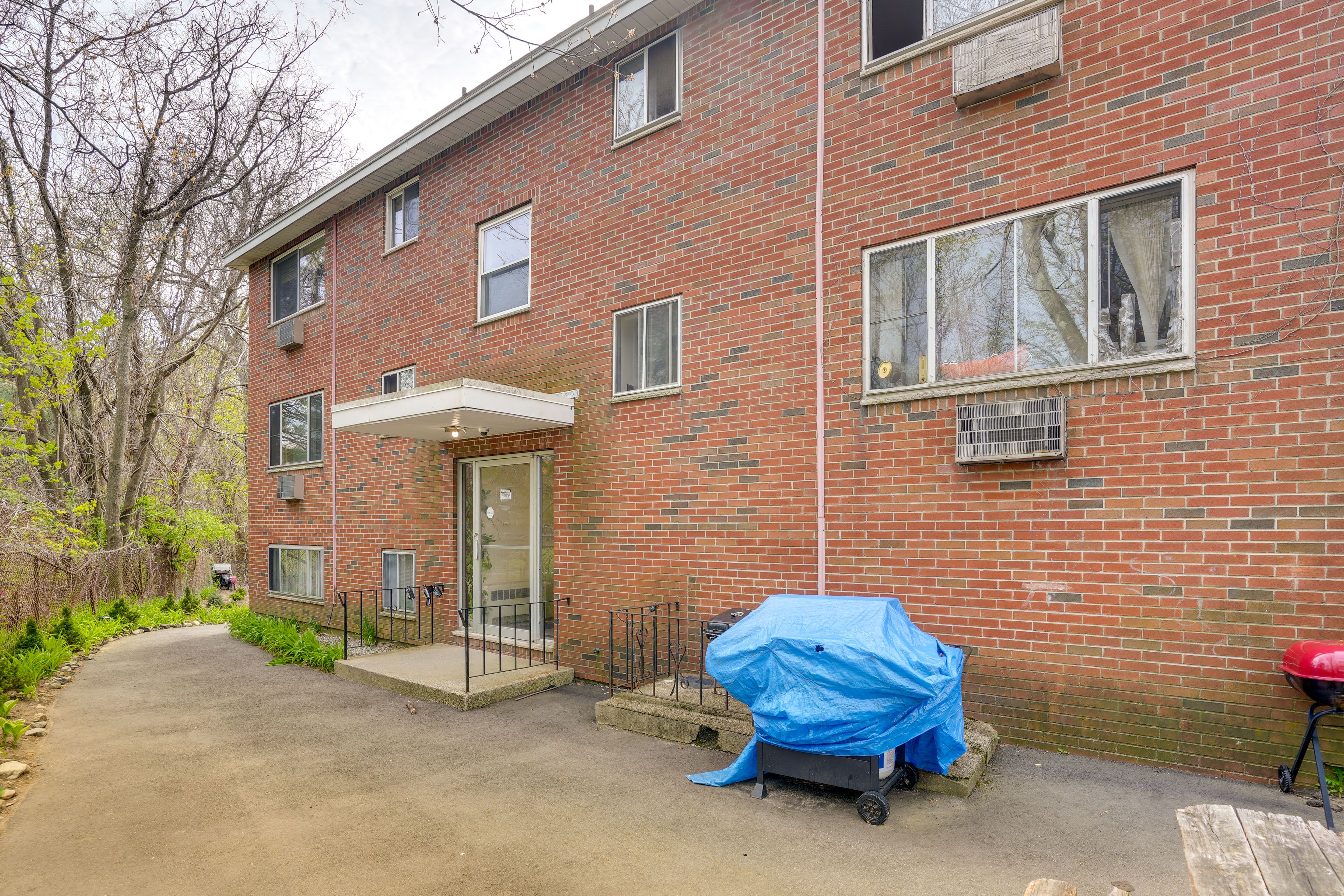 Back Exterior | Shared Grills | Coin Laundry
