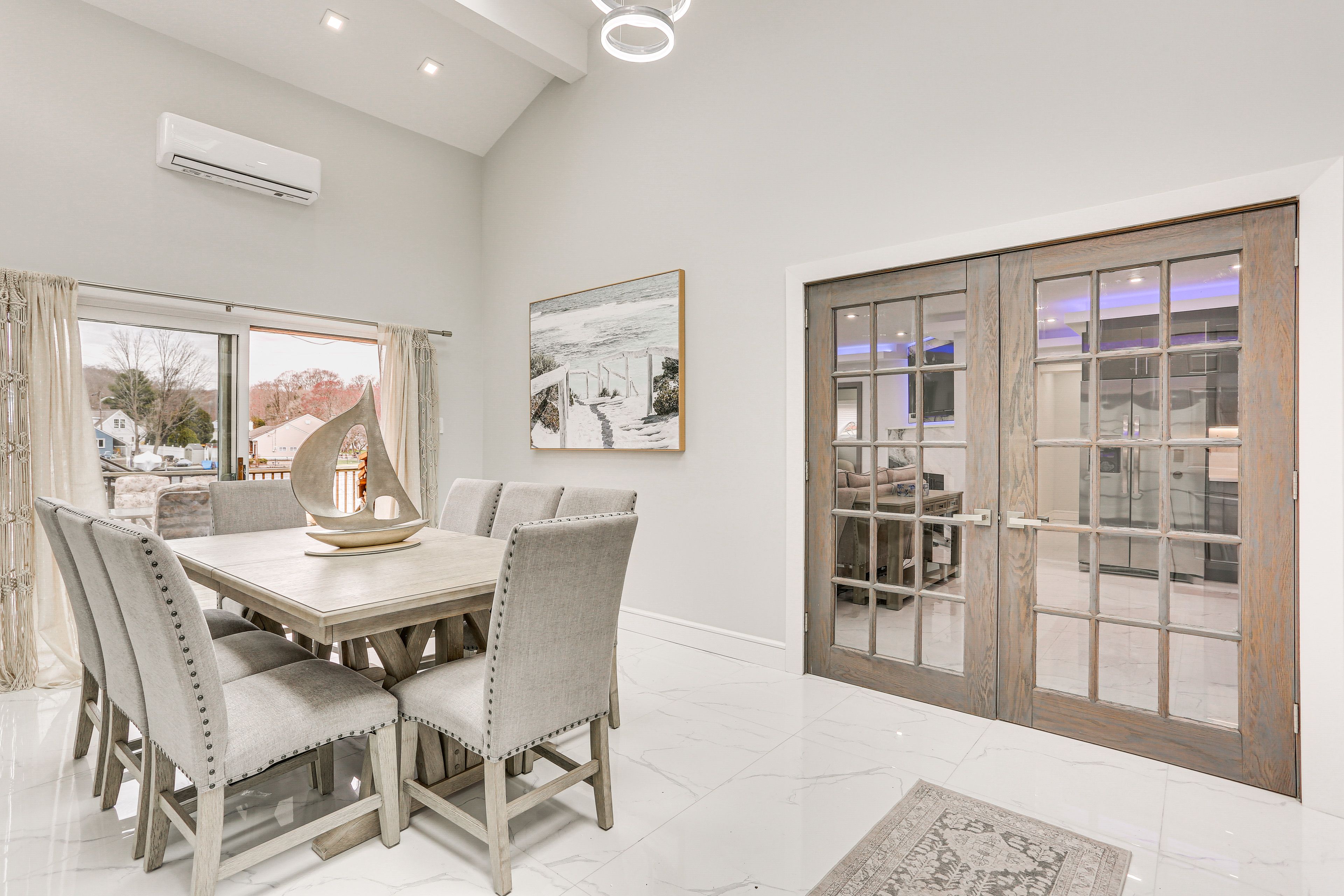Dining Area | Dishware & Flatware Provided | Central A/C & Heat | 1st Floor