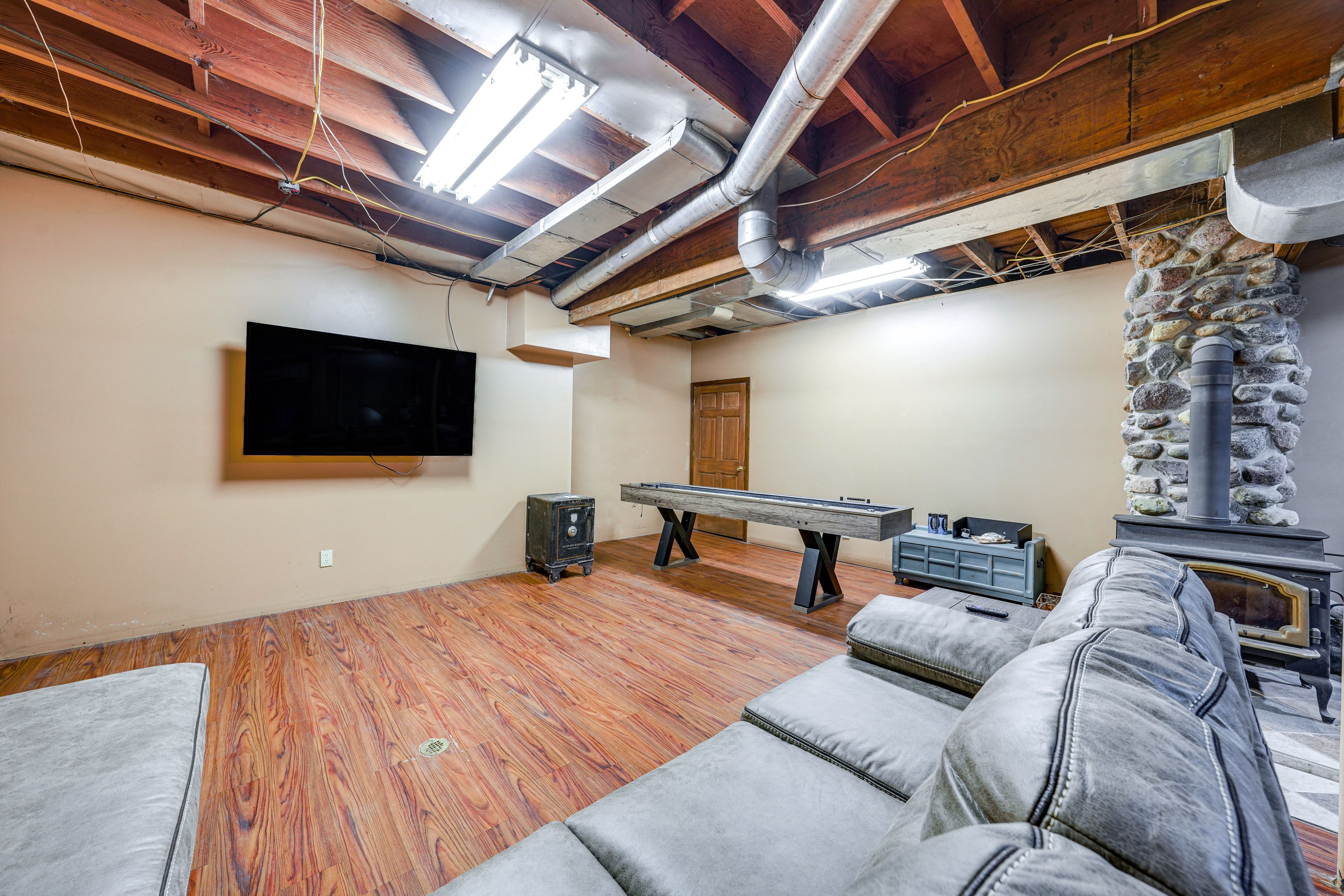 Game Room | Lower Level | Shuffleboard | Wood-Burning Stove (Wood Provided)