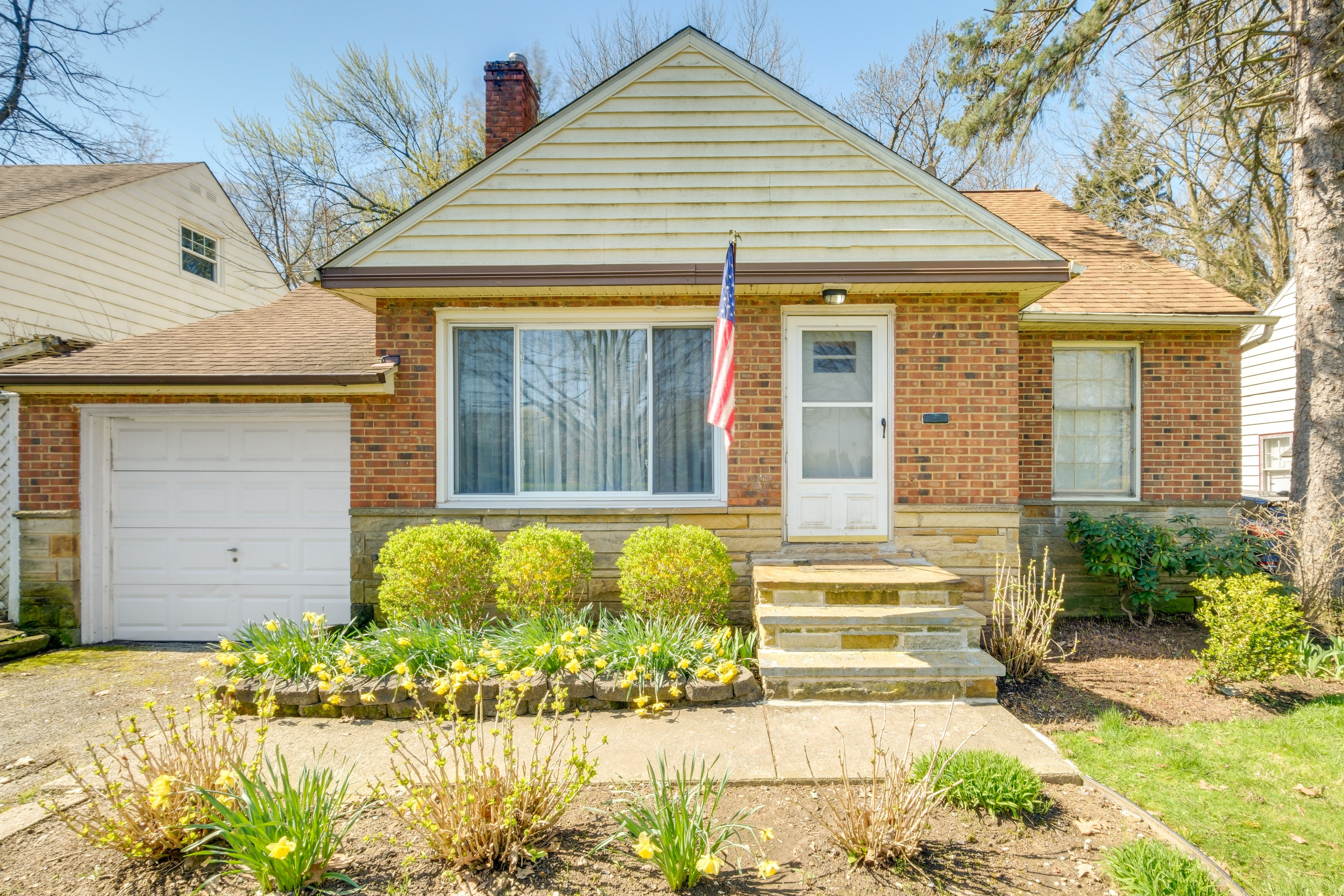House Exterior | Sunroom | Outdoor Dining Area | Fenced Backyard