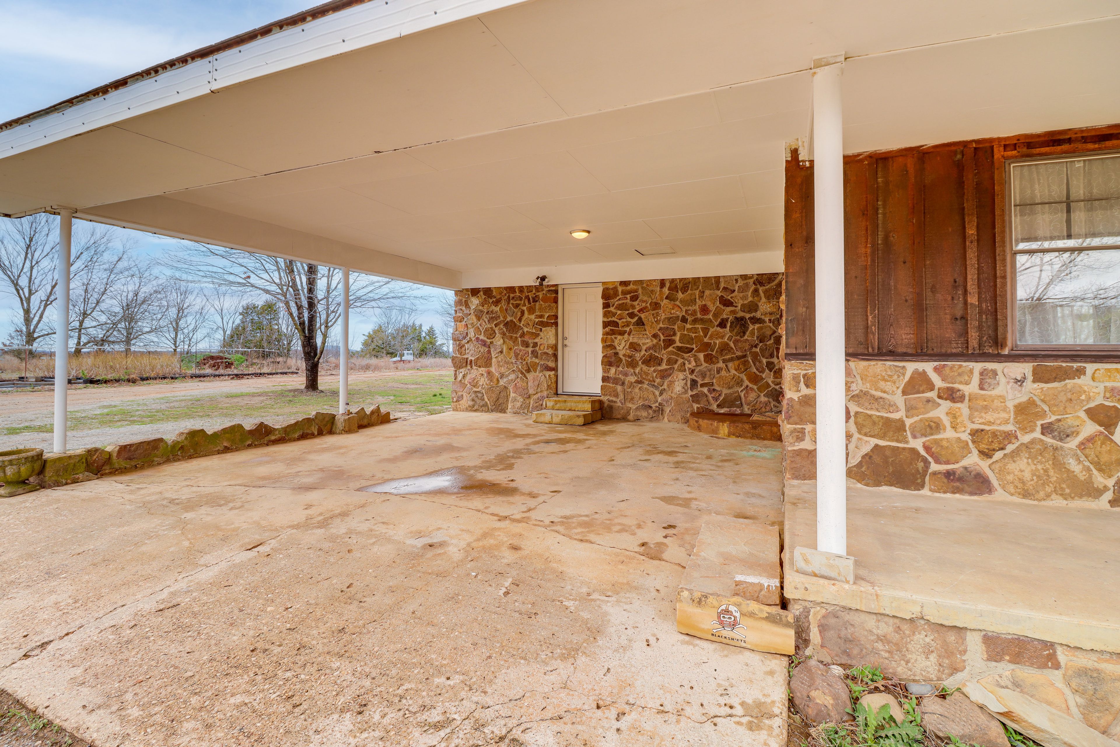 Parking | Carport (2 Vehicles) | Shared Gravel Driveway (2 Vehicles)