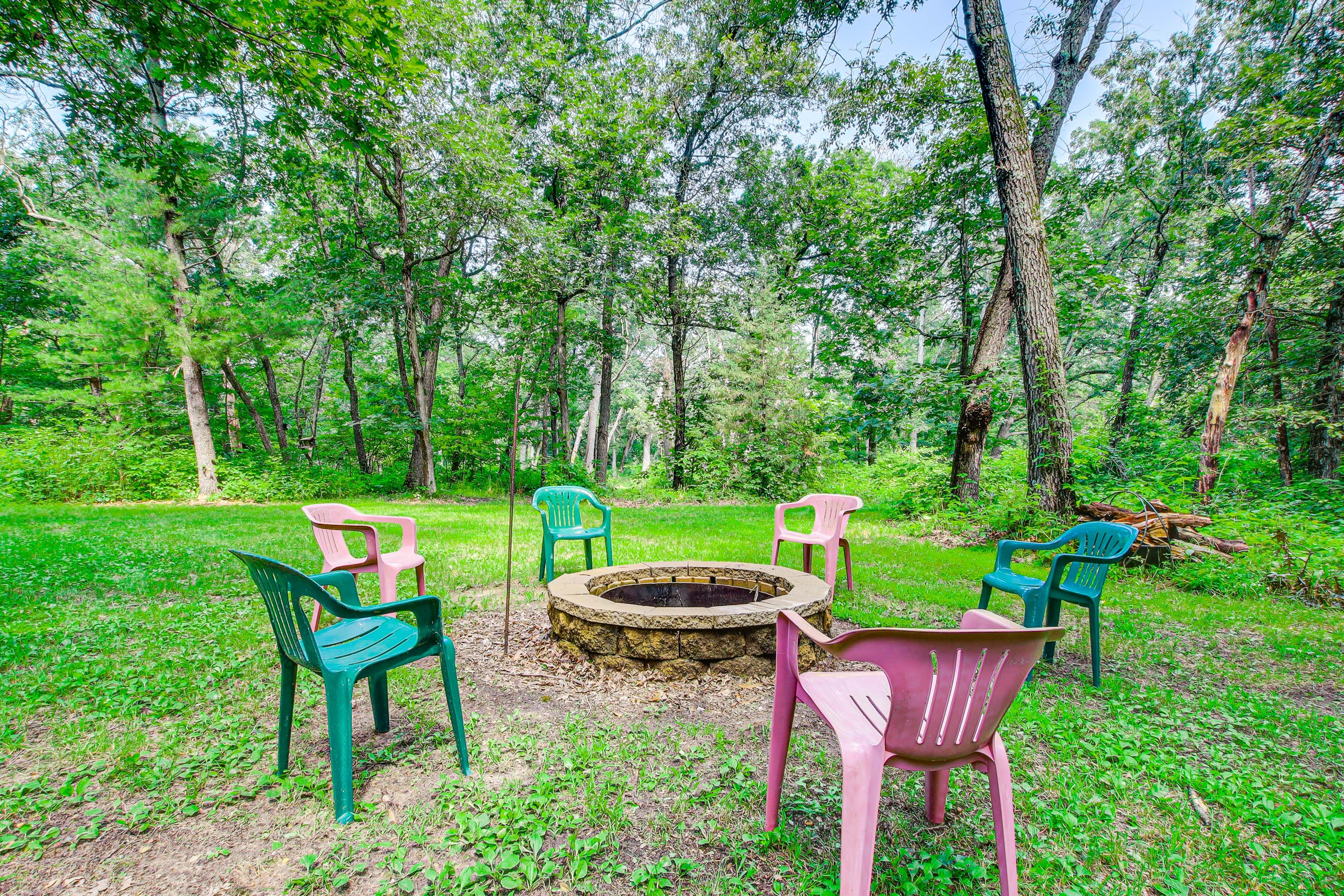 Cabin Exterior | Fire Pit | Private Yard w/ Games