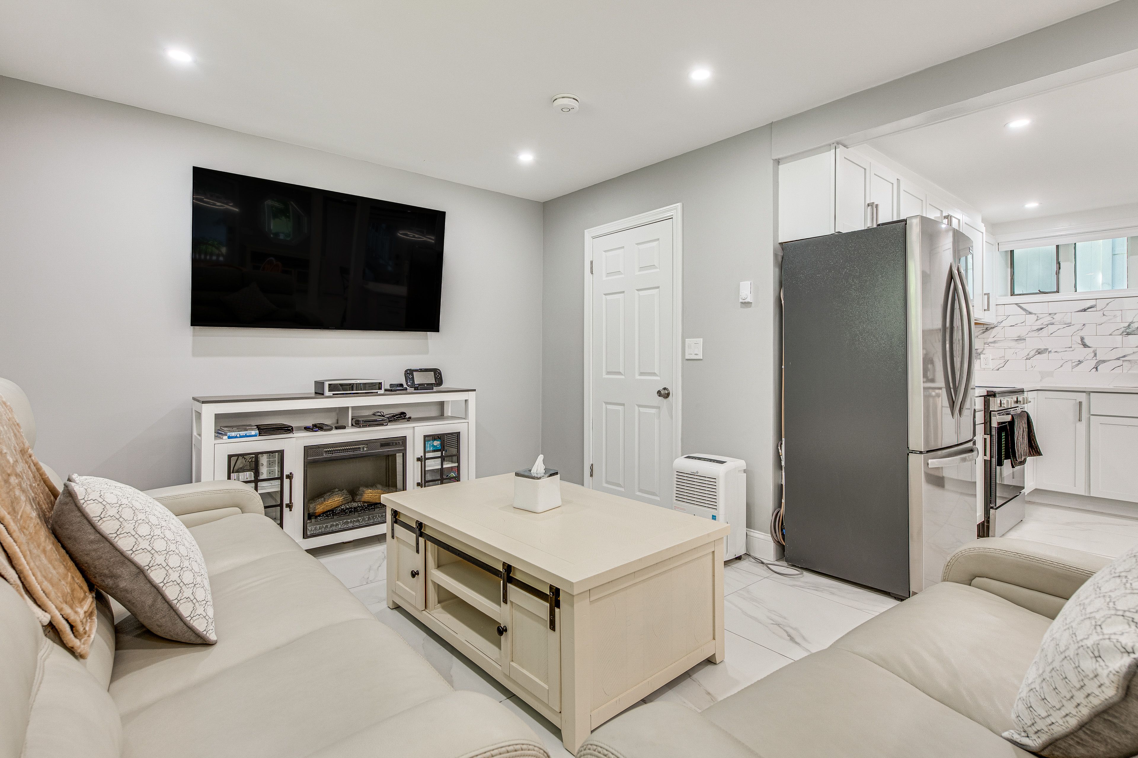 Living Room | 1st Floor | 65" Smart TV | Video Games | Electric Fireplace