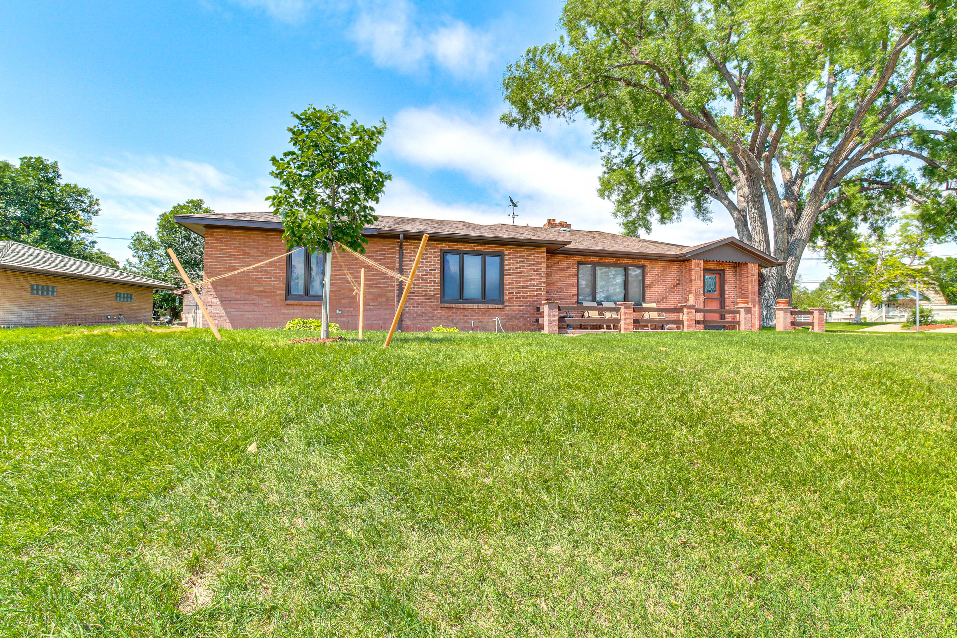 Front Exterior | Spacious Yard