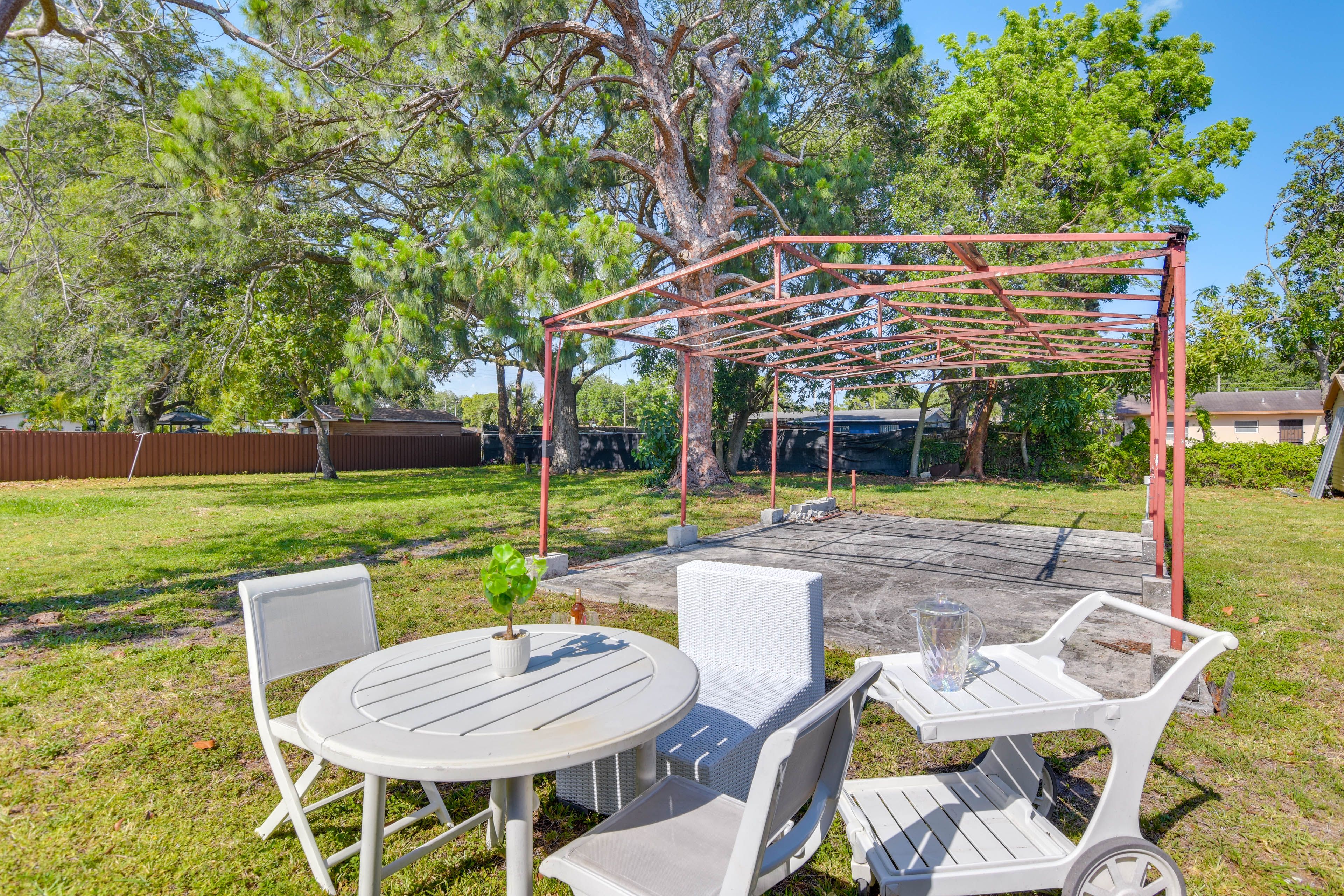 Shared Backyard | Dining Space | ~4 Mi to Amelia Earhart Park