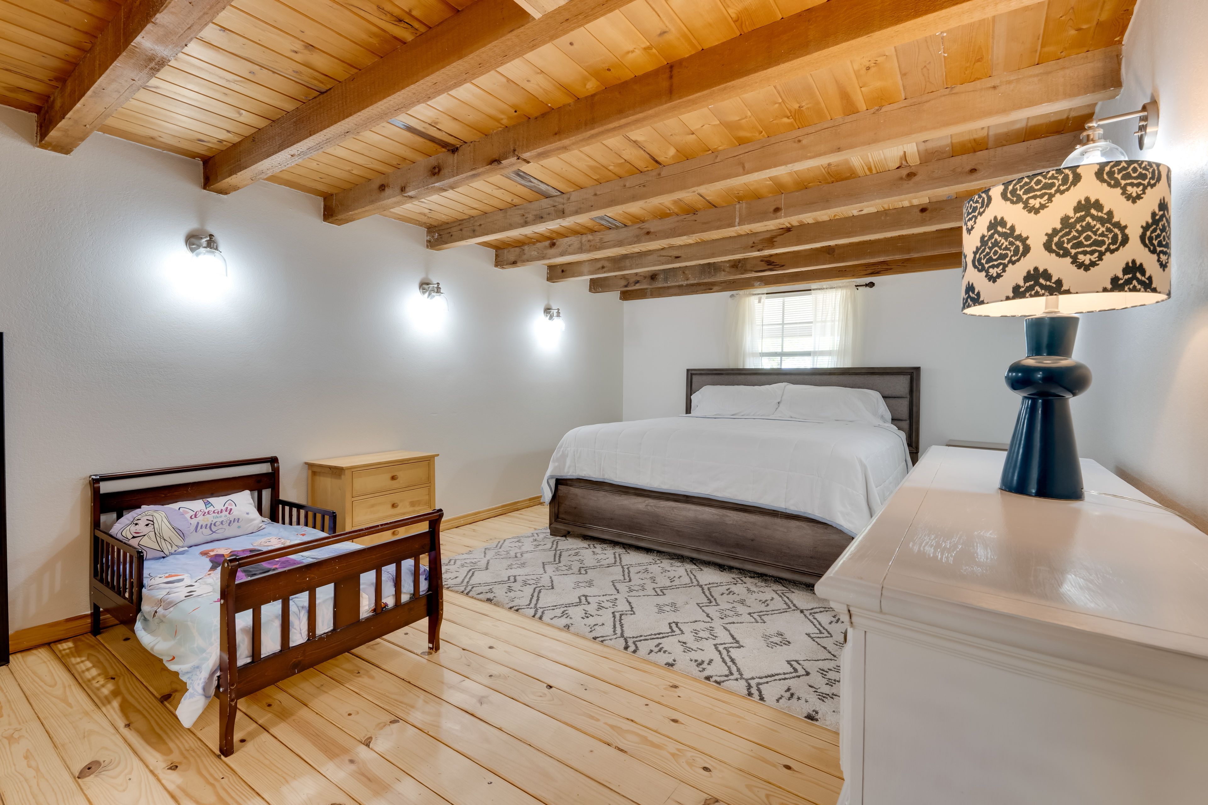 Bedroom 1 | 1st Floor | King Bed | Toddler Bed | Linens Provided