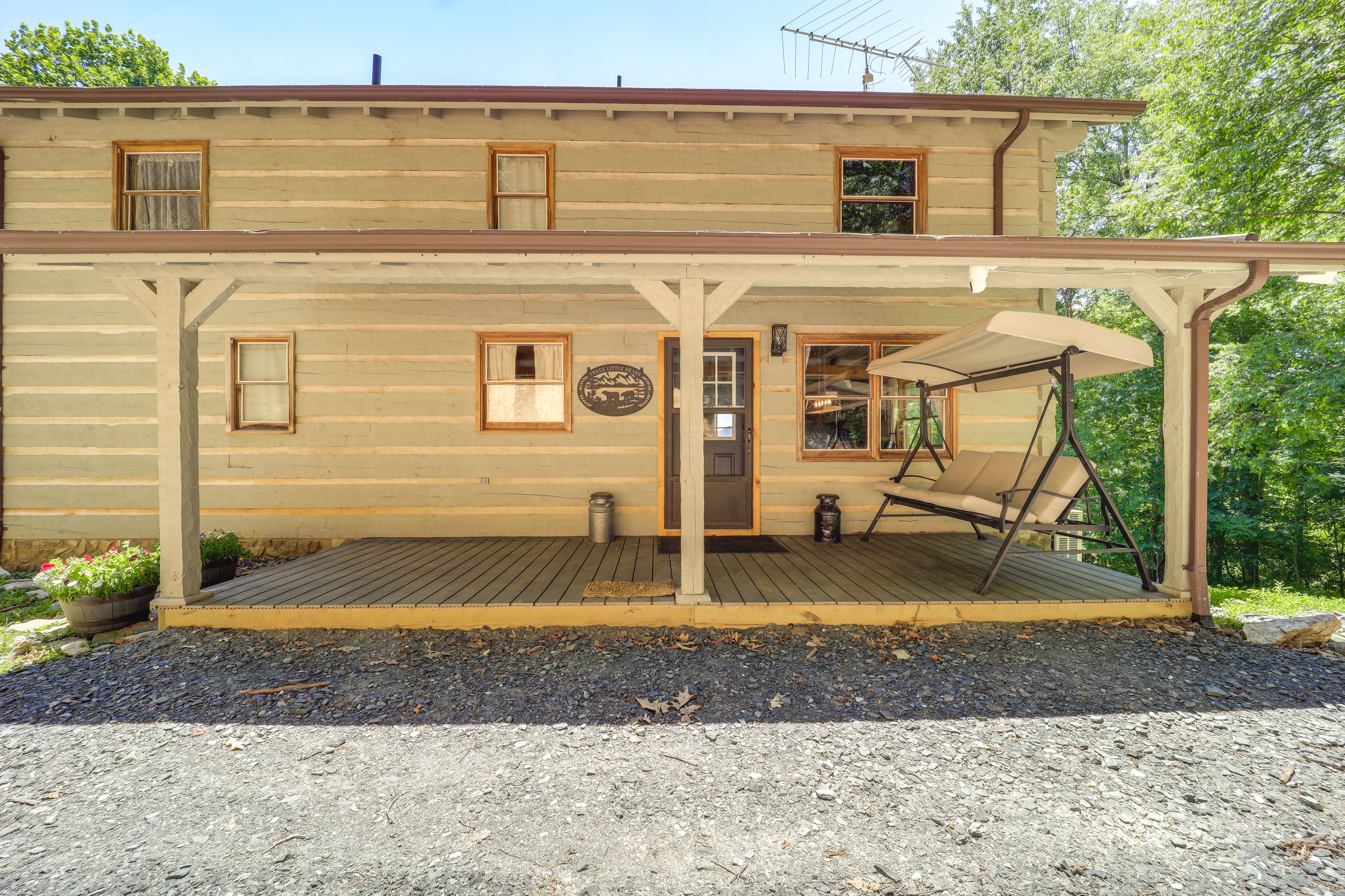 Covered Porch w/ Swing | Property Entry