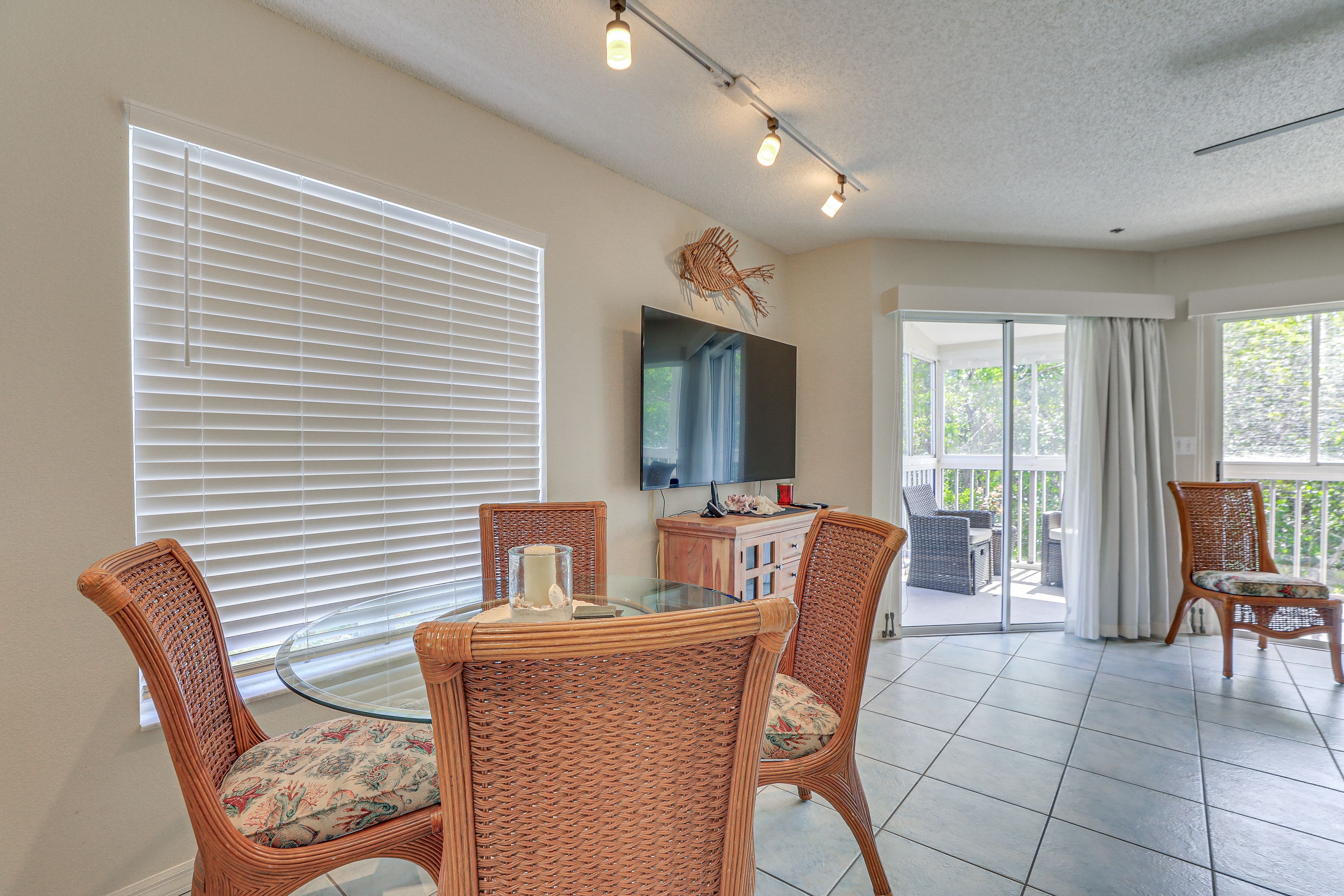 Dining Area | Dishware Provided | Bar-Top Seating | Main Level
