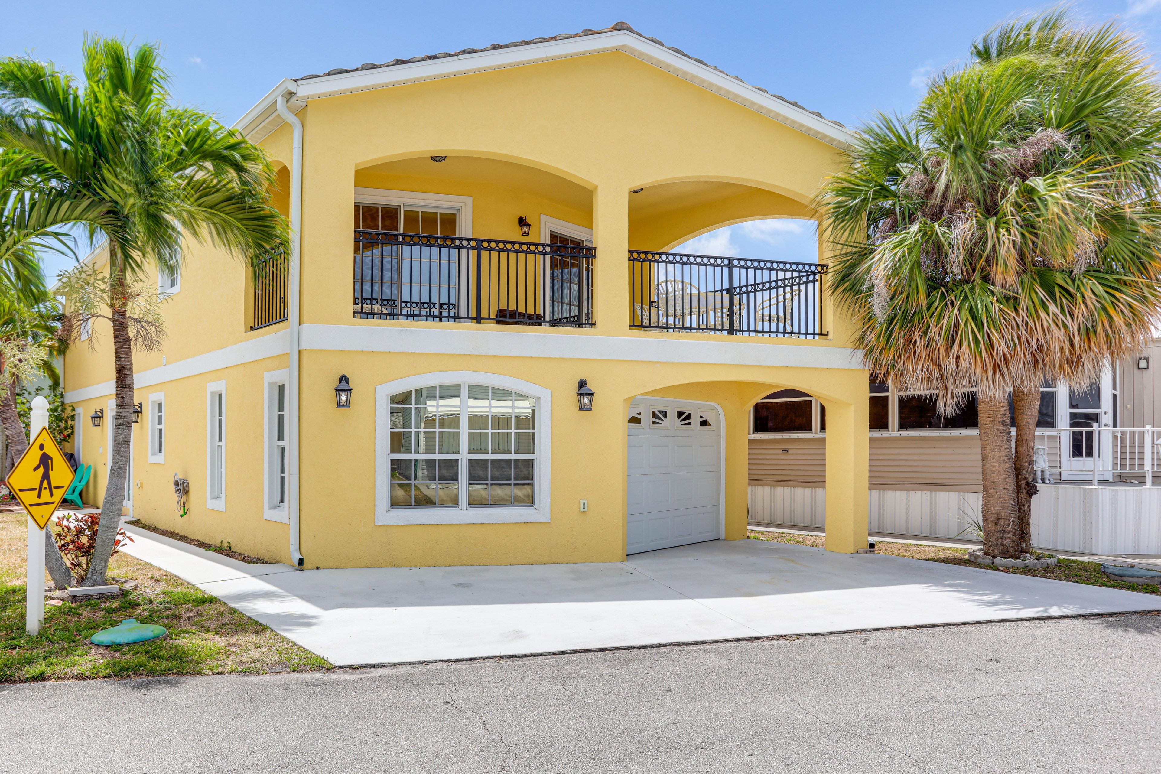Home Exterior | Expansive Balcony | Walk to Beach