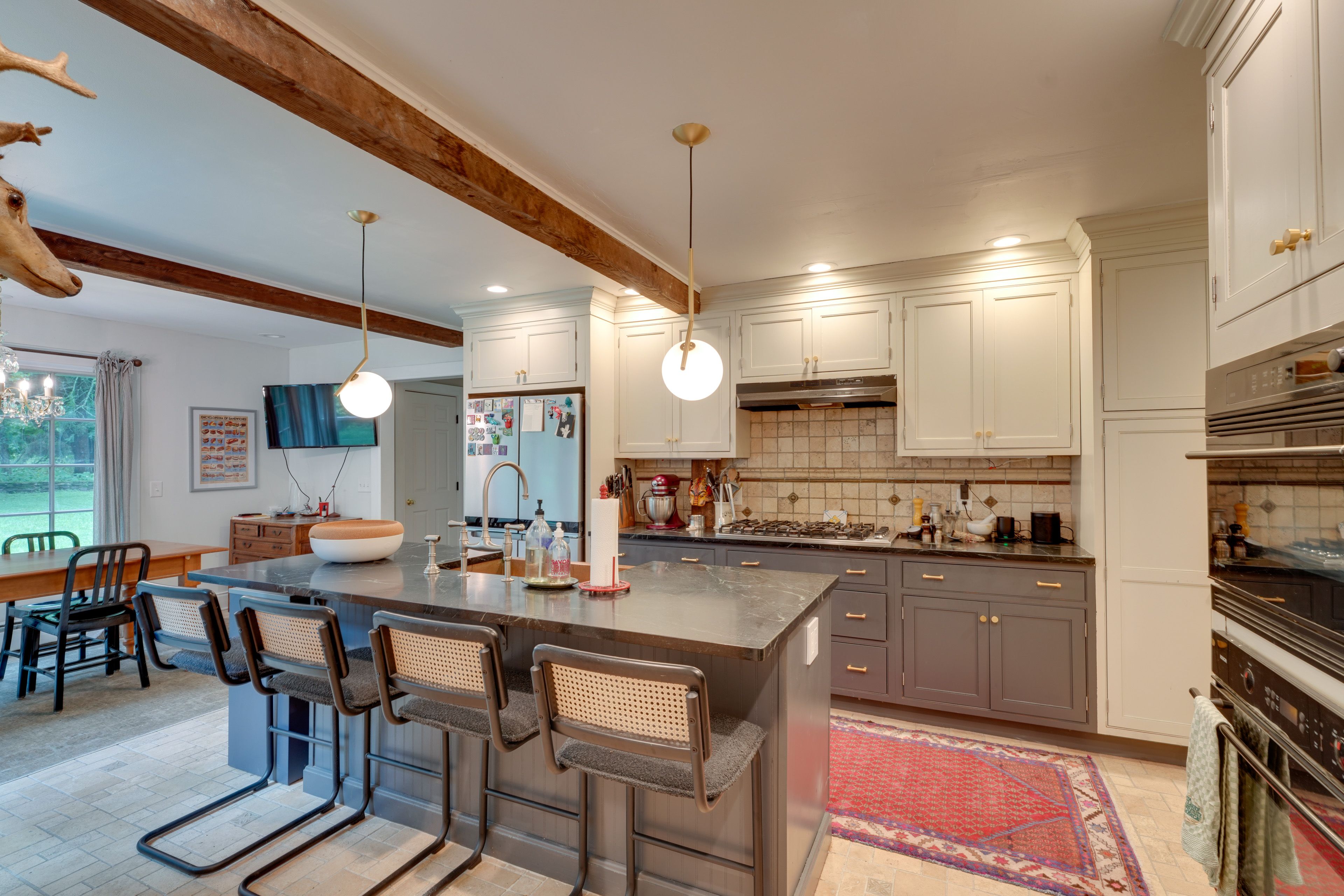 Kitchen | 1st Floor | Stainless Steel Appliances w/ Dishwasher | Breakfast Bar