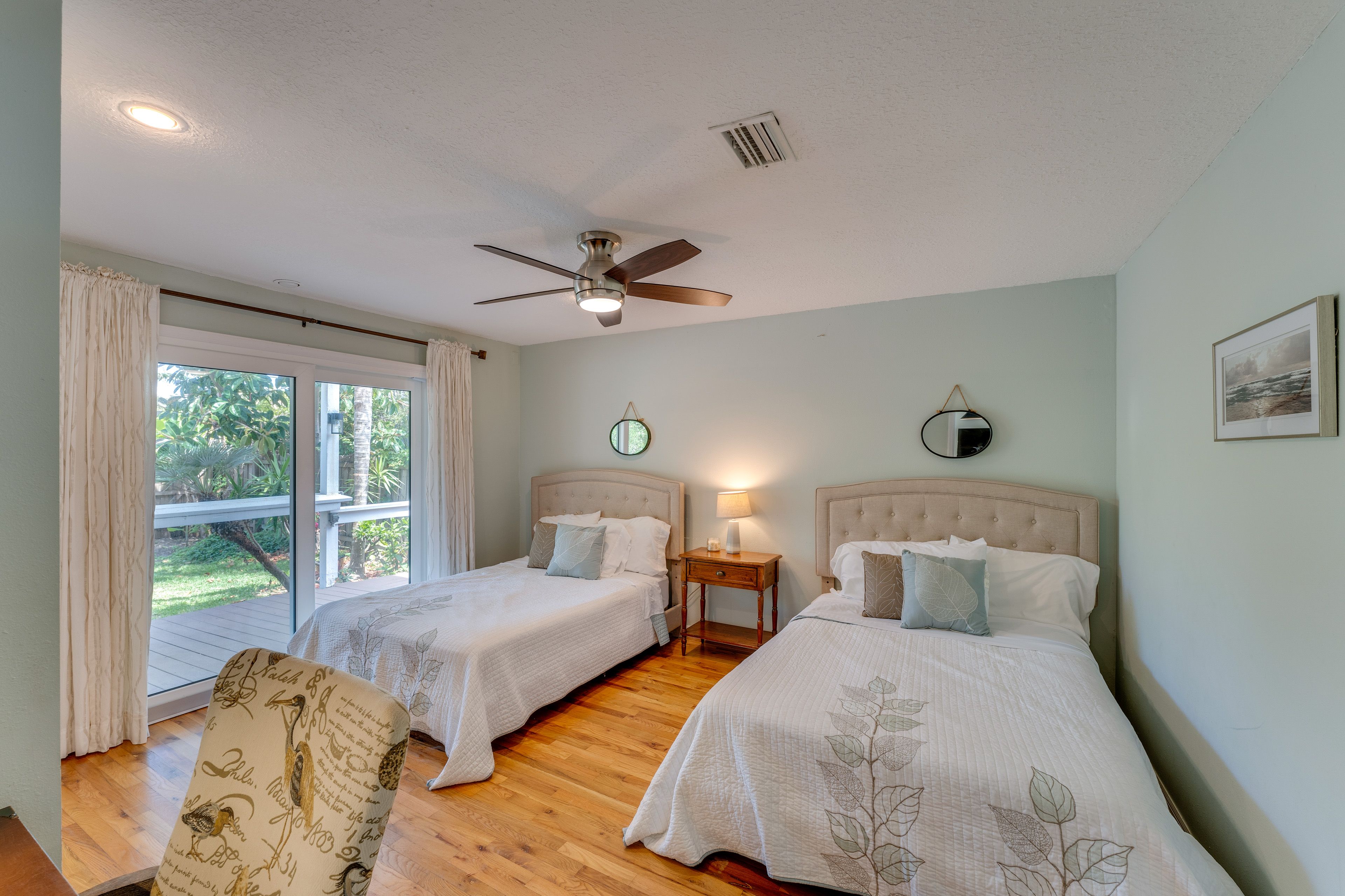 Bedroom 3 | 1st Floor | 2 Full Beds | Patio Access | Linens Provided