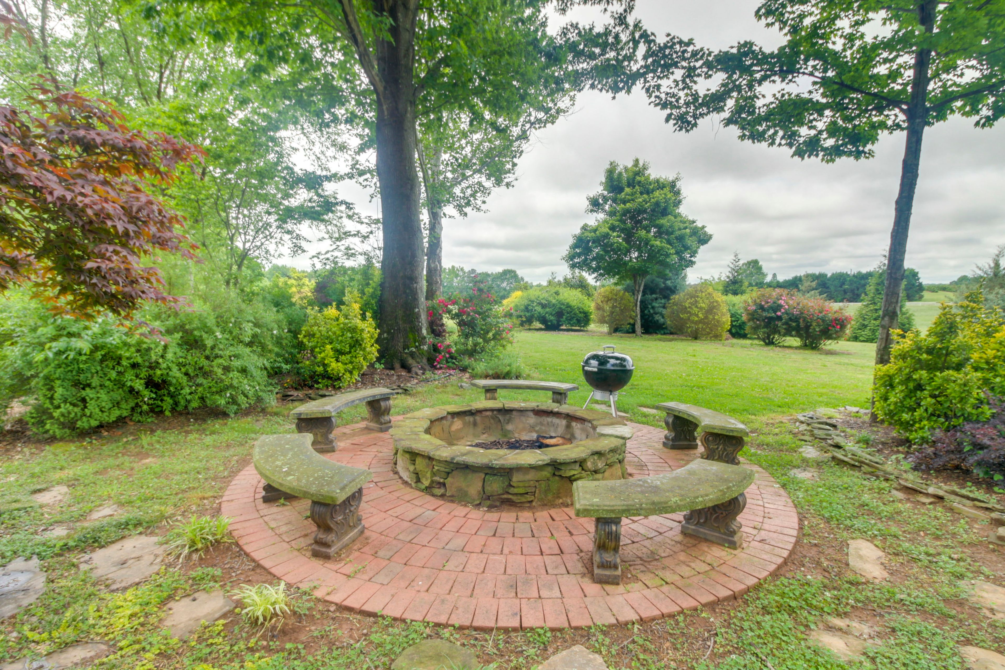Community Amenities | Wood-Burning Fire Pit | On-Site Hiking Trails