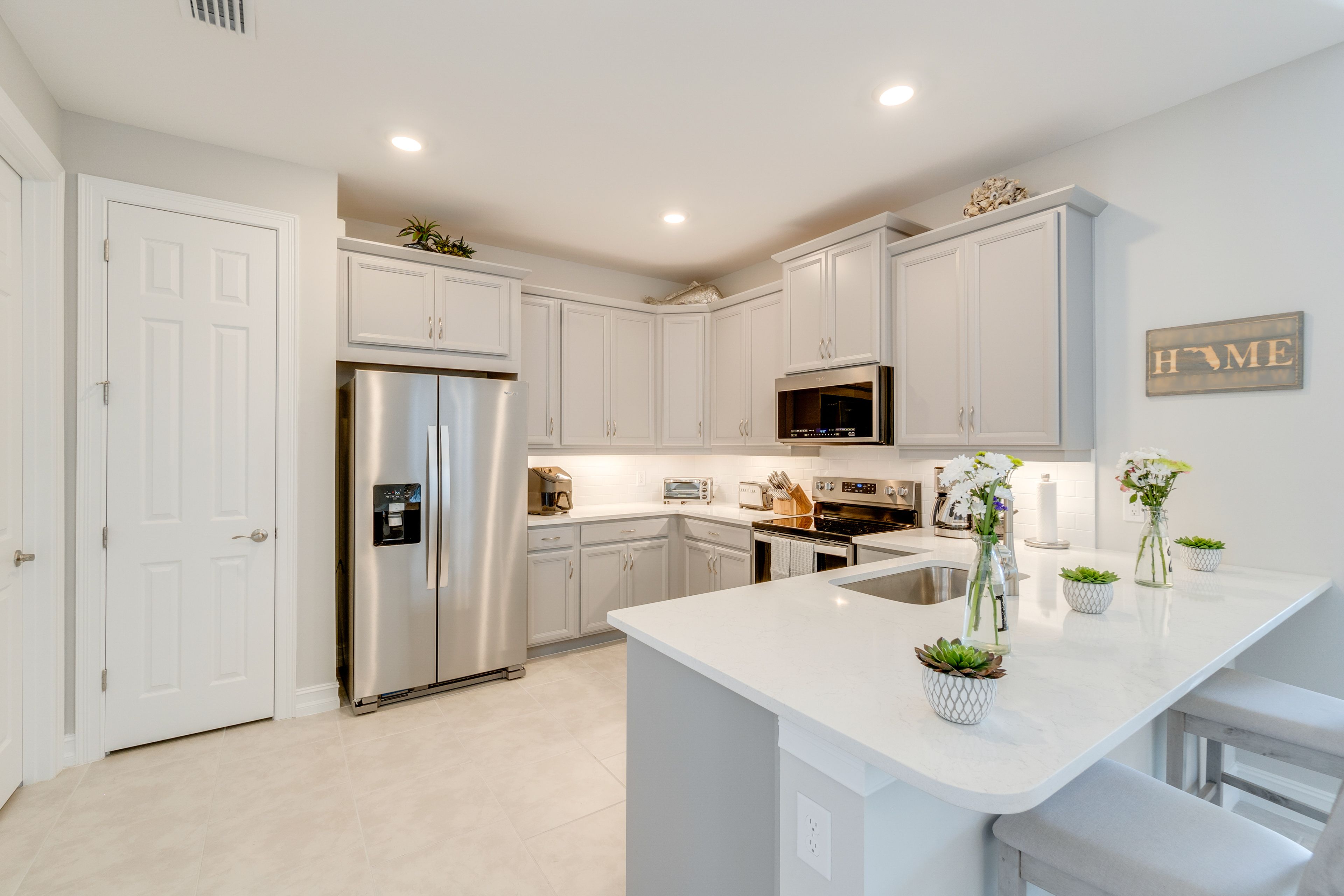 Kitchen | Stainless Steel Appliances w/ Dishwasher | Breakfast Bar
