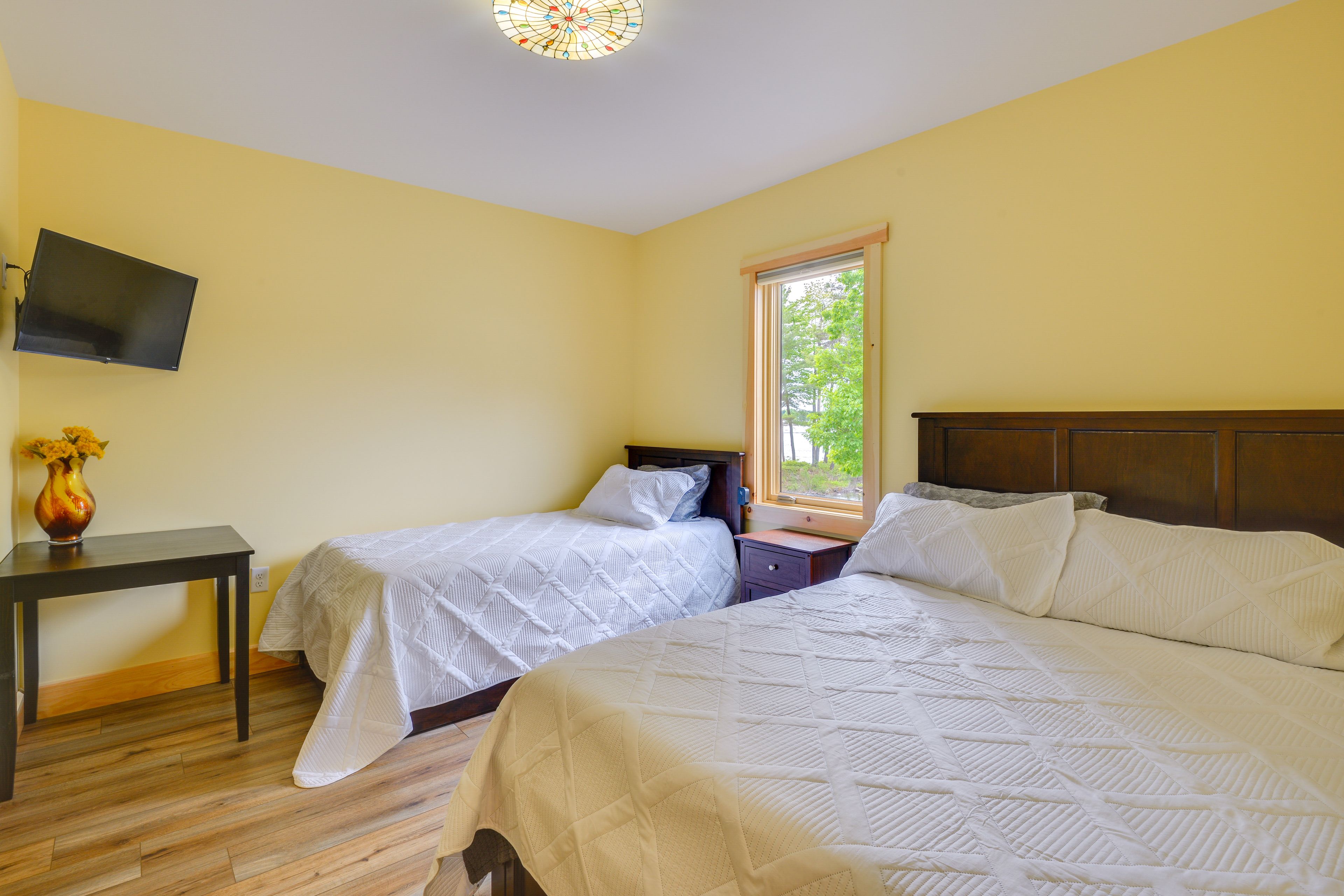 Bedroom 2 | Main Level | Queen Bed | Twin Bed | Smart TV w/ Cable