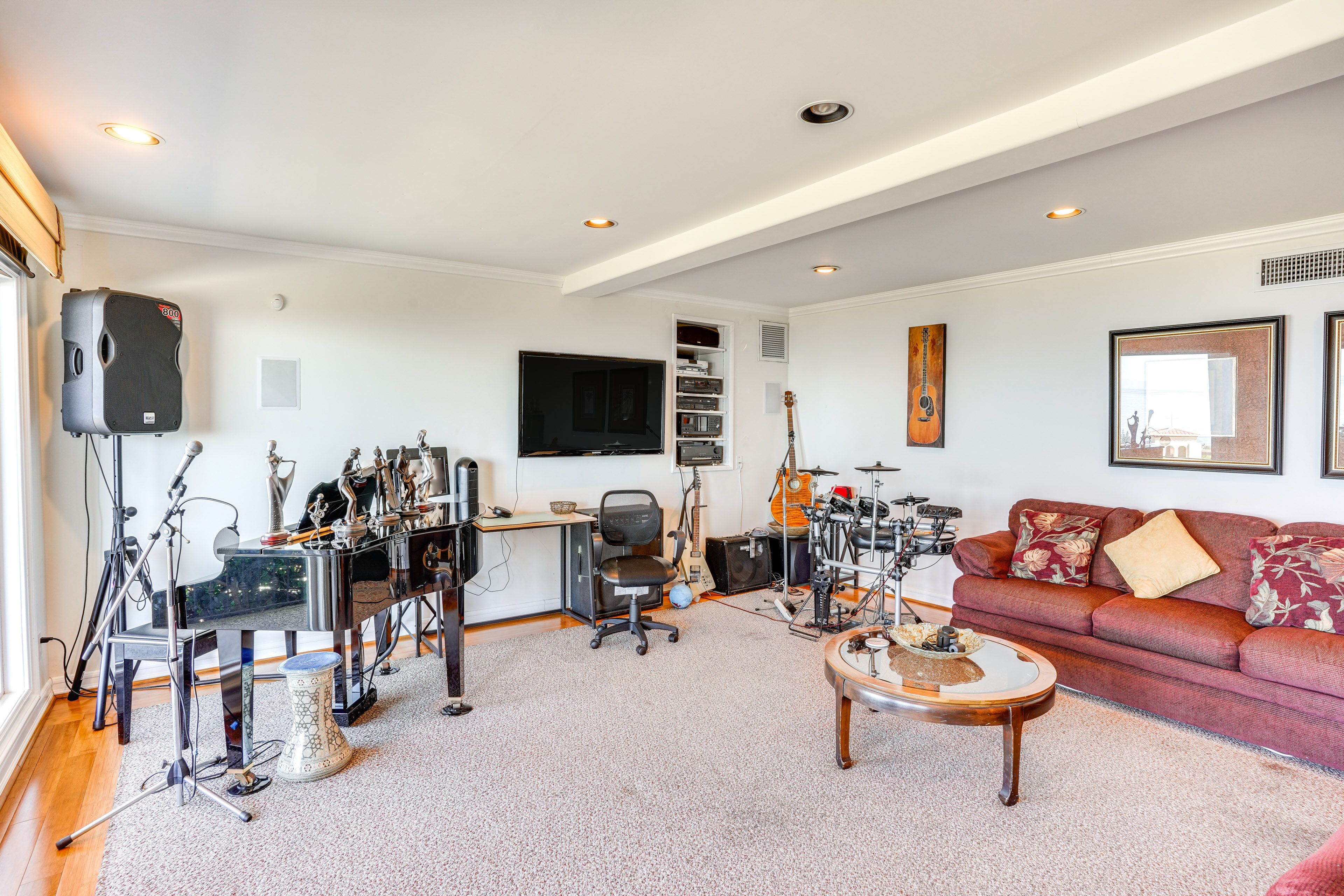 Bedroom 1 | Queen Sleeper Sofa | Piano | Guitars | Electronic Drum Set