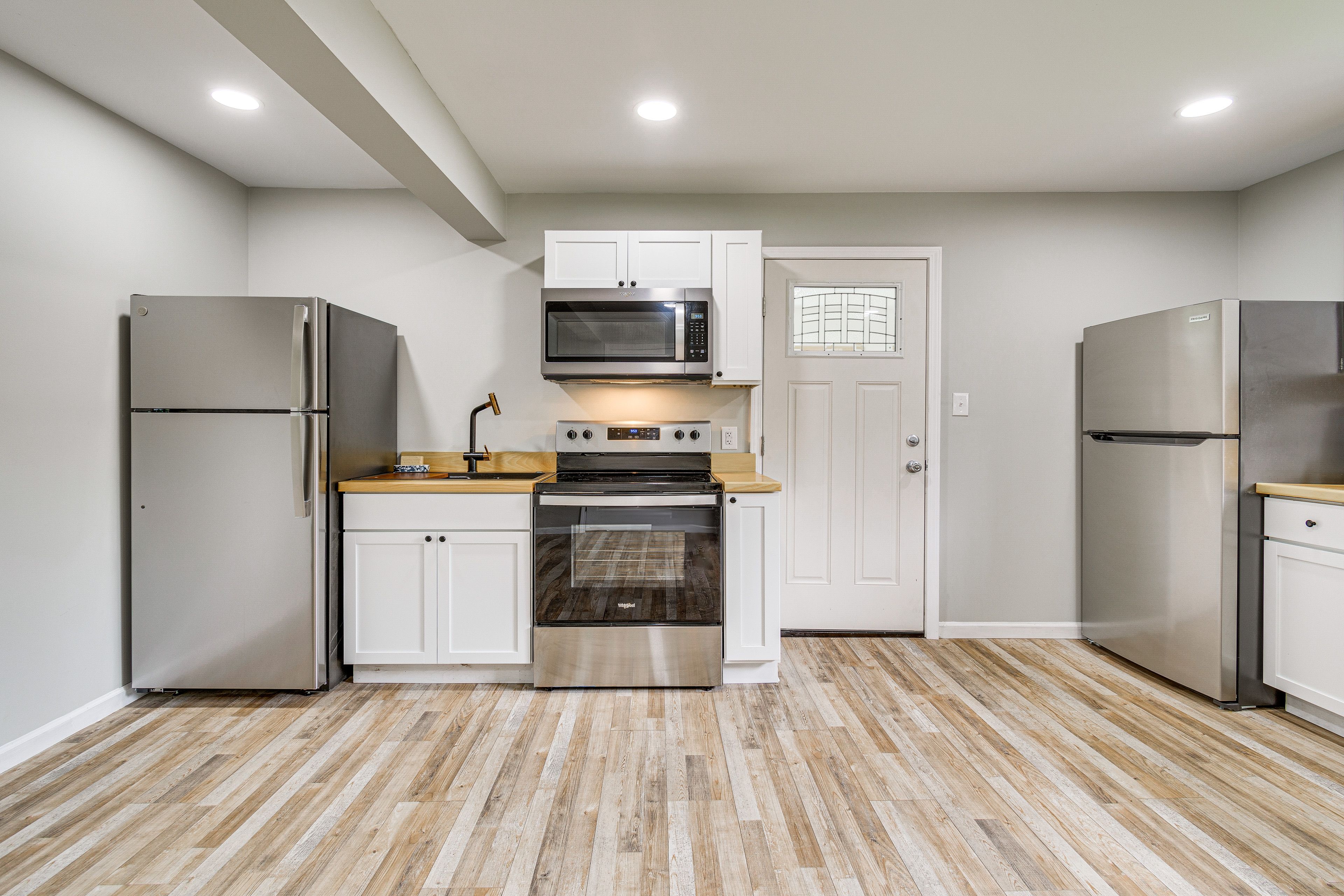 Kitchen | 2 Stoves/Ovens | 2 Refrigerators | 2 Microwaves | 1st Floor