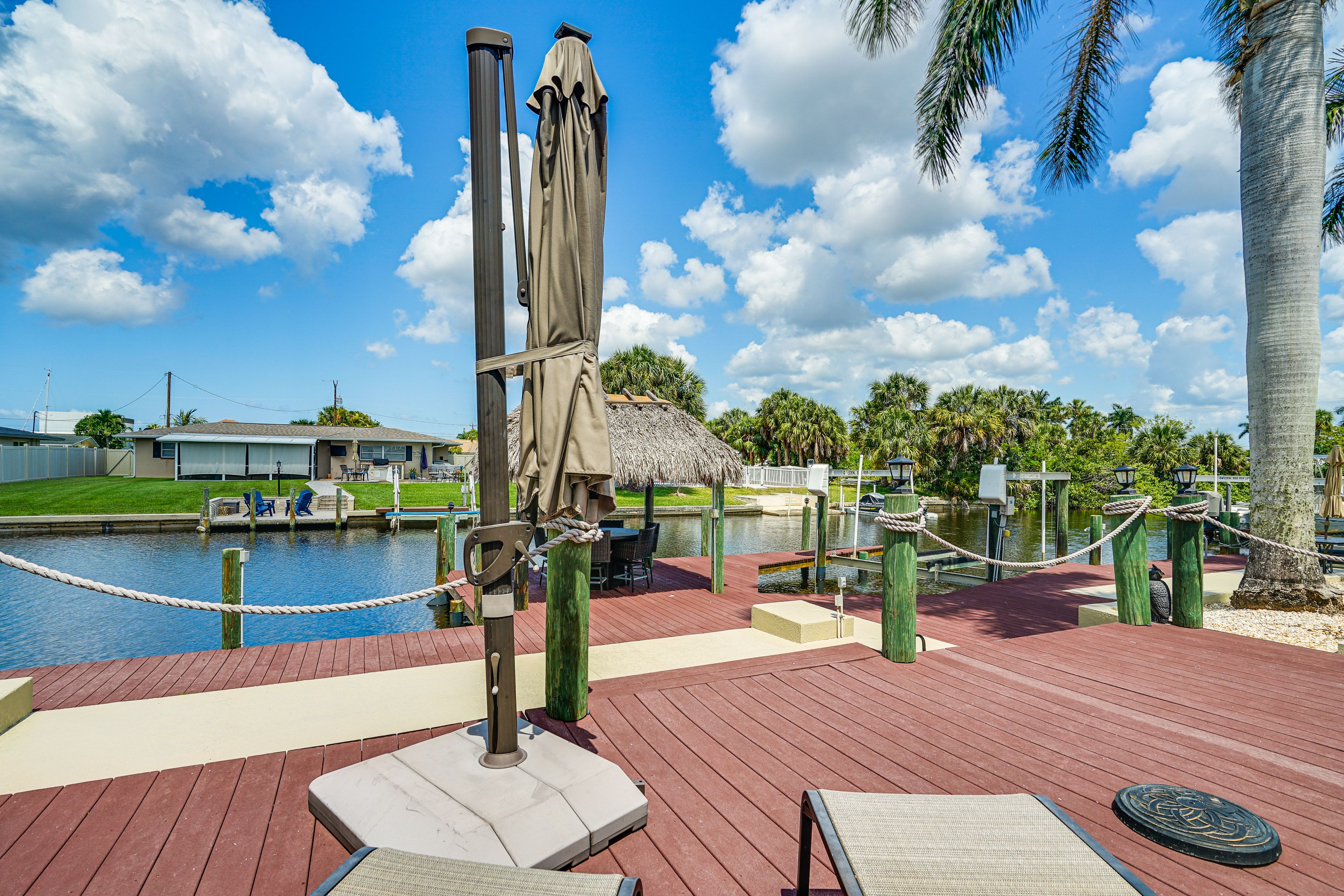 House Exterior | Furnished Deck w/ Lounge Chairs