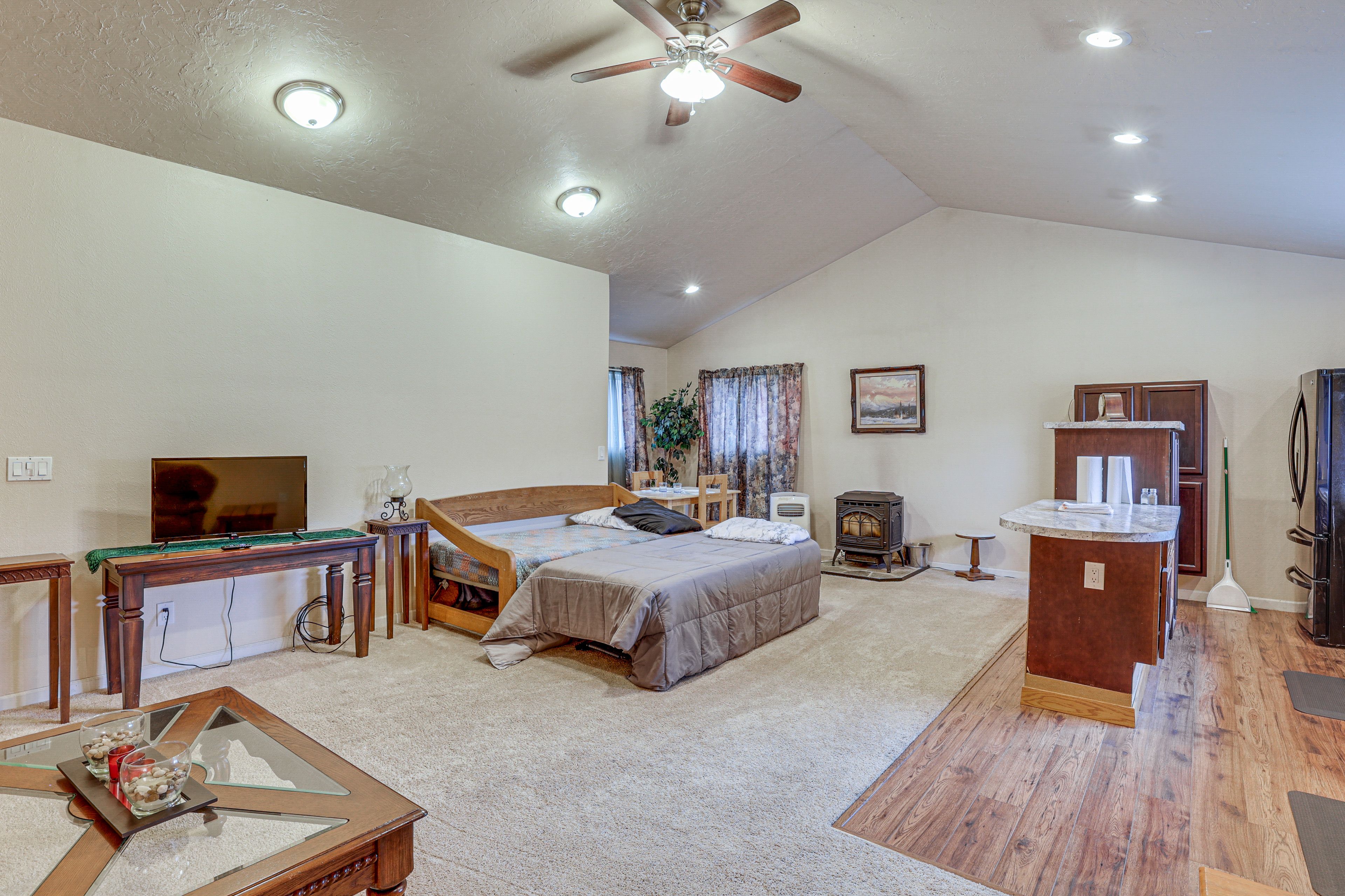 Living Area | Pellet Stove | Books | Twin Daybed w/ Twin Trundle