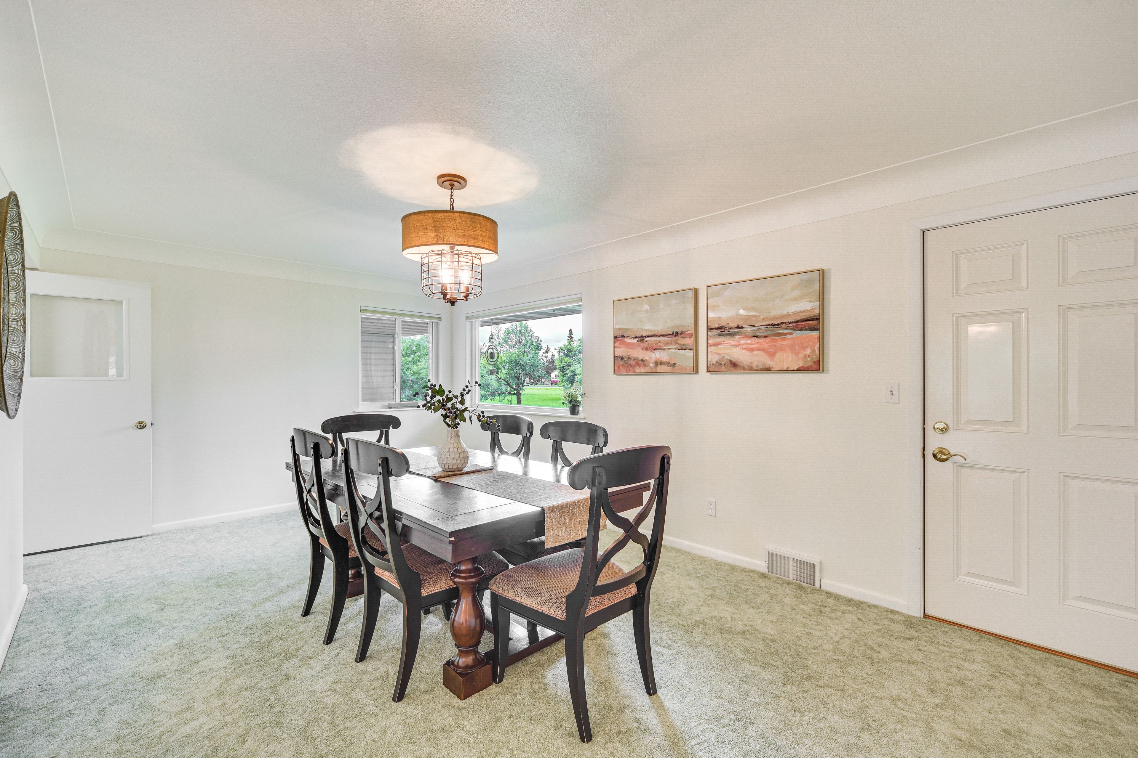 Dining Area | Central A/C & Heating | 1st Floor